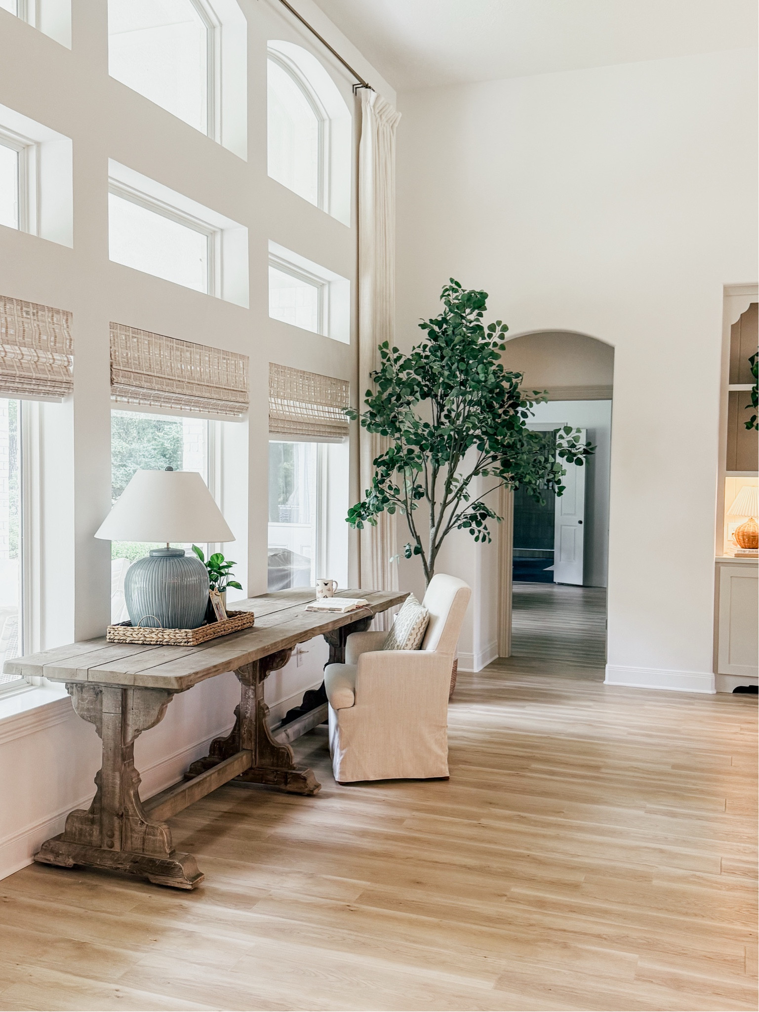 Well a dining table was just what I needed in this big open space! It’s narrow and fit the space perfect! 

THEBLOOMINGNEST desk living room shades curtains desk chair tree 

#LTKHome #LTKSeasonal #LTKStyleTip