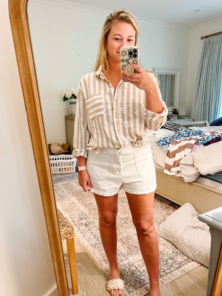 Easy breezy summer outfit ! Can’t go wrong with white shorts and a linen button down shirt! Love tan and white stripe combo! 

#LTKSeasonal #LTKunder50 #LTKtravel
