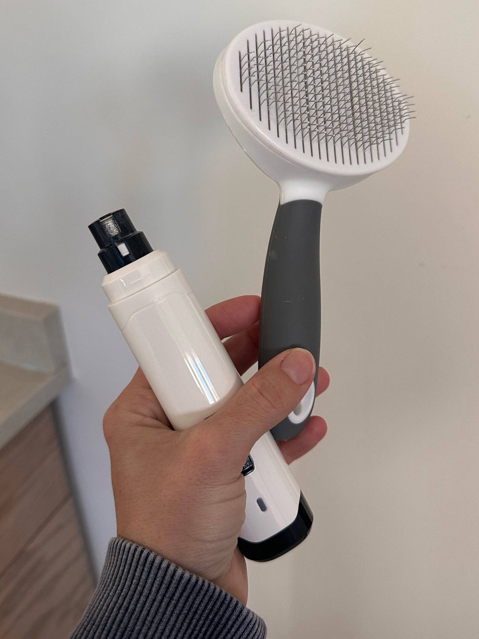 Puppy grooming tools we love. The slicker brush doesn’t damage the undercoat and the nail dremmel files and smooths! 