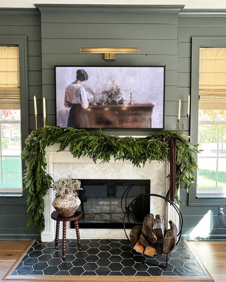 This year’s fireplace mantel garland is hung. 7 strands of Norfolk pine, 2 seeded eucalyptus garlands (one broken into pieces), and some baby fern picks to fill it out. This is the most dramatic garland I’ve done—I’ll share previous year’s versions too so you can compare! 

#LTKSeasonal #LTKHoliday #LTKhome