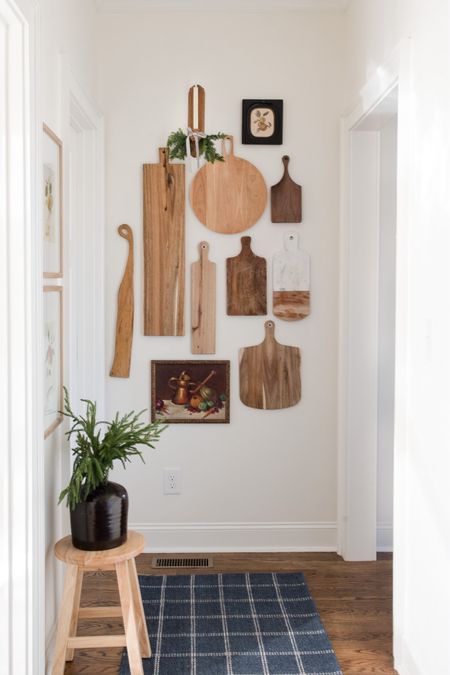 Wood cutting board gallery wall is not only functional but pretty!  All decorated for the holiday. Christmas kitchen decor 

#LTKhome #LTKSeasonal #LTKHoliday