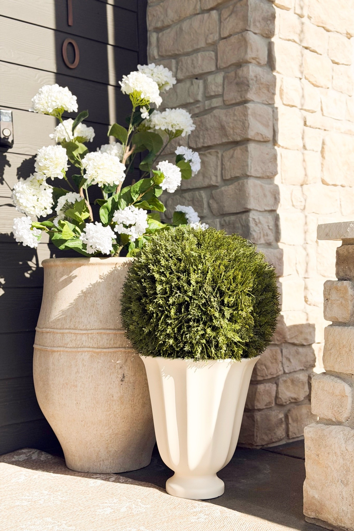 The gorgeous outdoor planters are perfect for all seasons!

Home, home decor, spring, spring home, spring home decor, spring front porch, faux greenery, hydrangeas, oversized planter

#LTKSeasonal #LTKHome