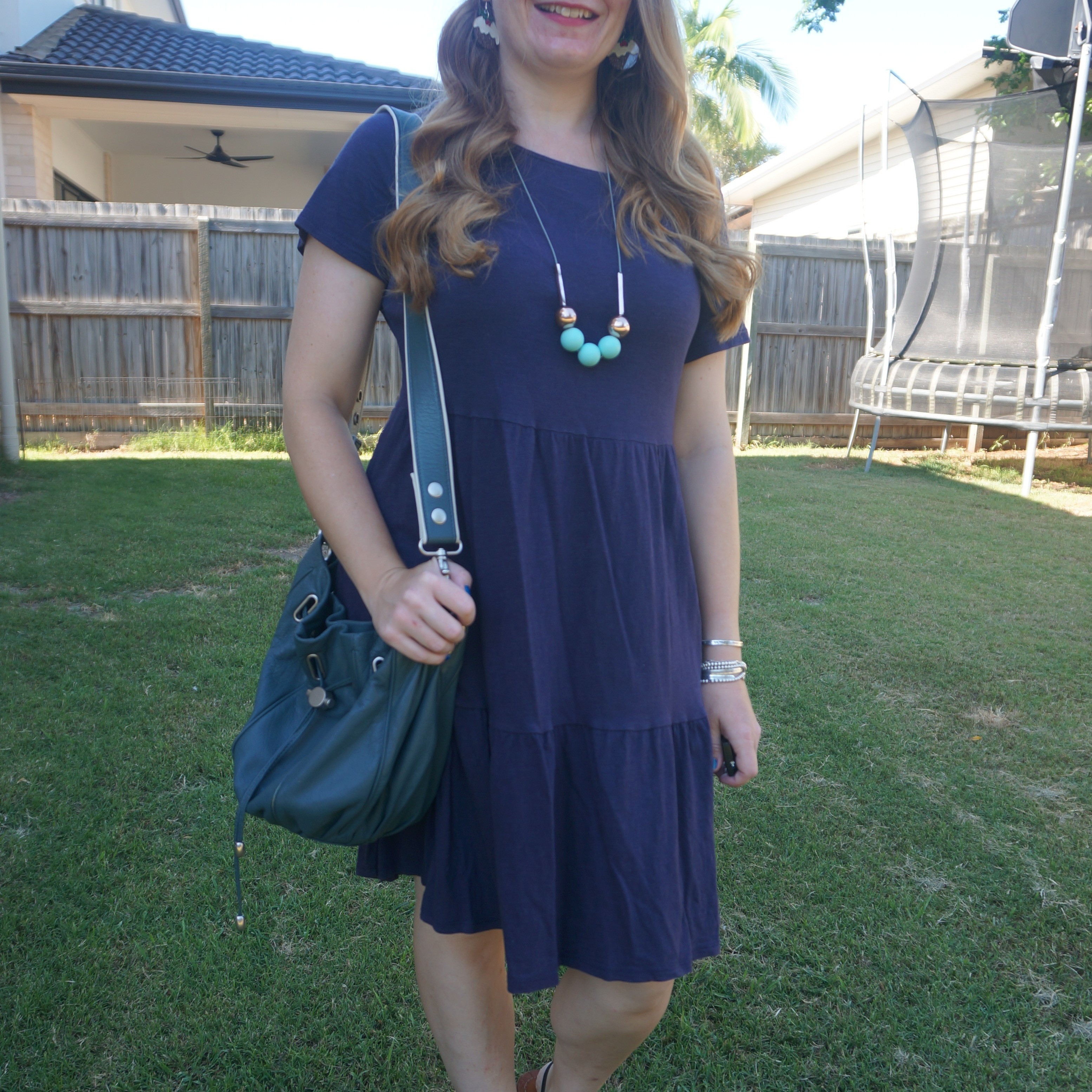 Kmart Anko navy tiered dress with Mimco teal cocoon bucket bag 💙💚

#LTKbag #LTKsummer #LTKaustralia