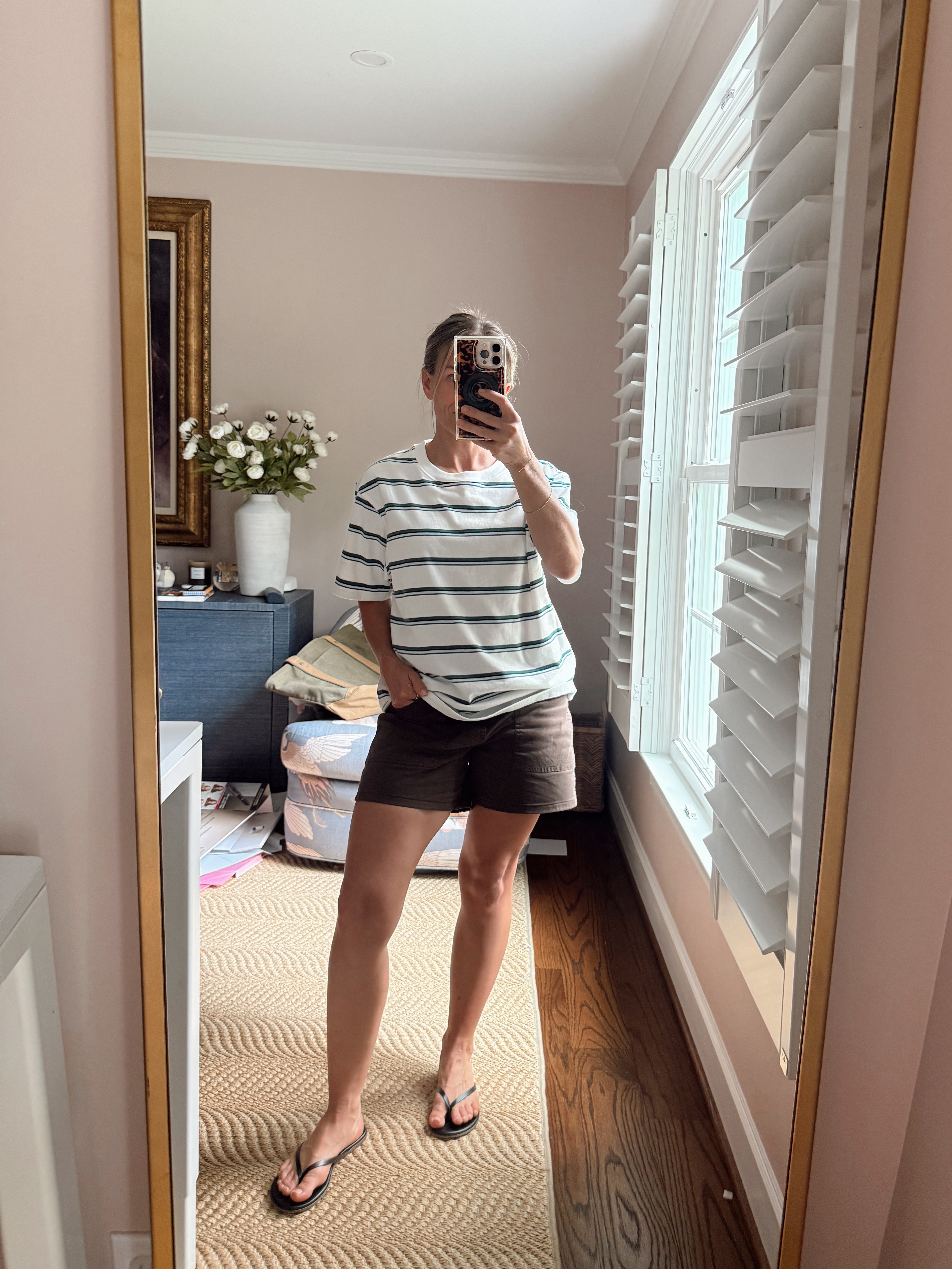 What I tried first: I first put on this striped shirt, but I felt so icky in it. And I realized the last two times I wore it, I had to talk myself into it. I love the shirt shape (I own it in black, white, and a navy stripe - which I even took to Utah last week), but I don’t like the color of these stripes. It’s pricey, so I told myself it was cute, but I didn’t feel cute in it.  

 #LTKootd #LTKOver40