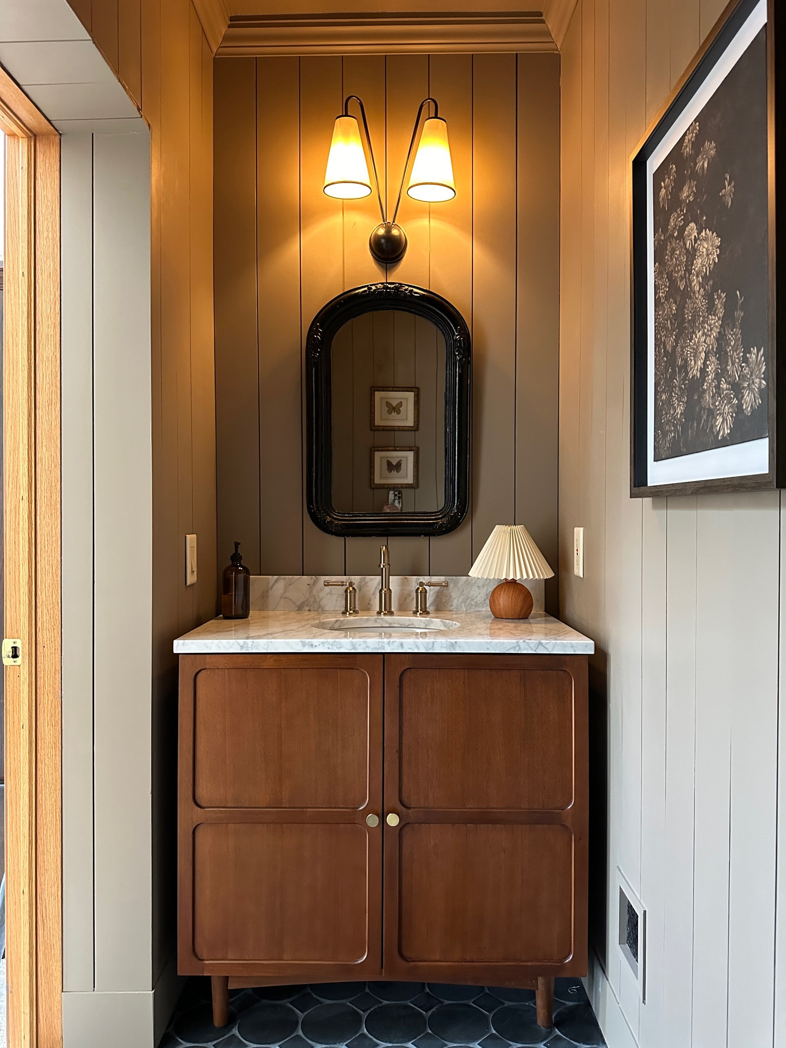 In love with the way our half bathroom turned out! The dark tones and moody decor is my favorite. Amazon lamp and Amazon tissue box, and this beautiful light fixture from Soho home! Affordable and cozy!

#LTKStyleTip #LTKU #LTKHome