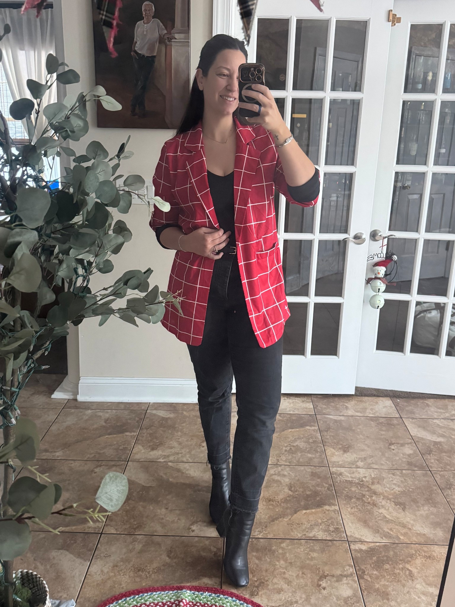 All black base, even the boots, with a pop of red. 

#LTKHoliday #LTKMidsize #LTKootd