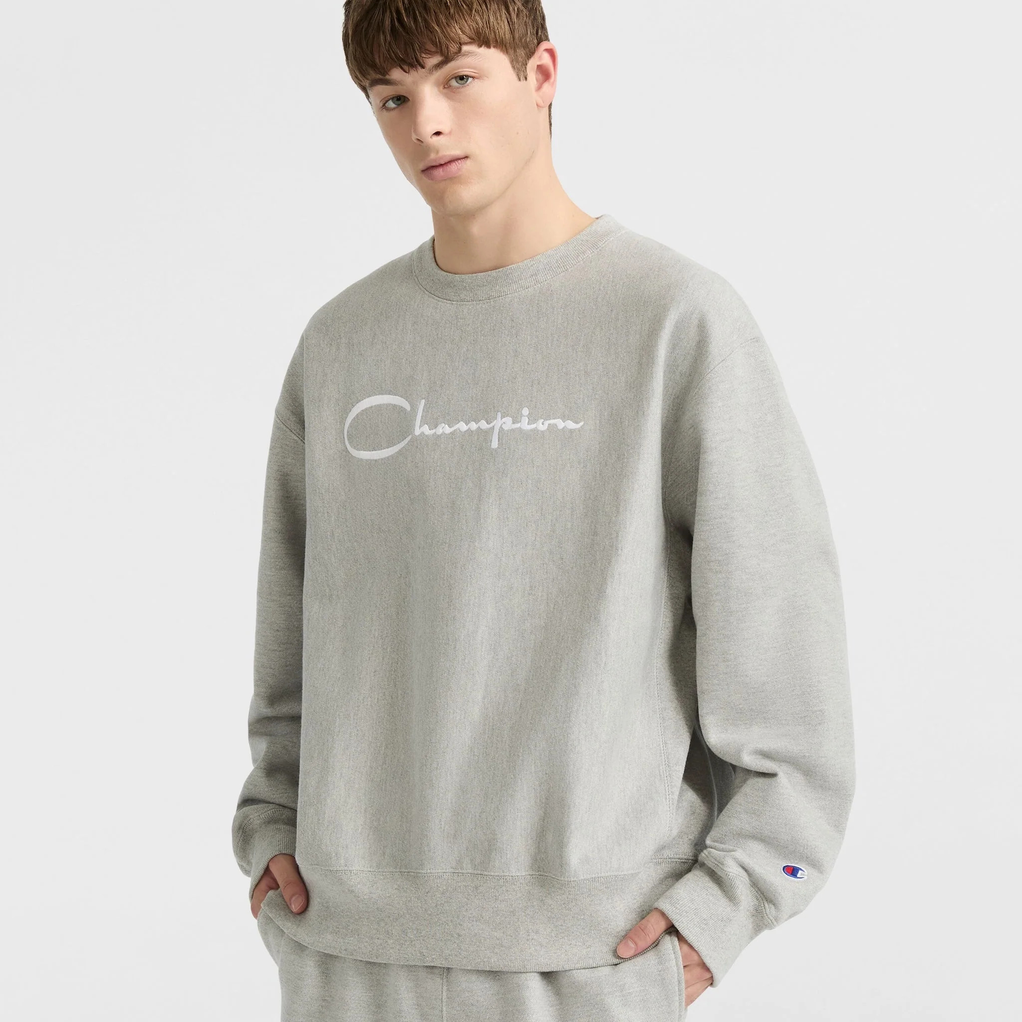 Reverse Weave Crewneck Sweatshirt, White Vintage Script Logo | ChampionUSA.com (Hanesbrands Inc.)