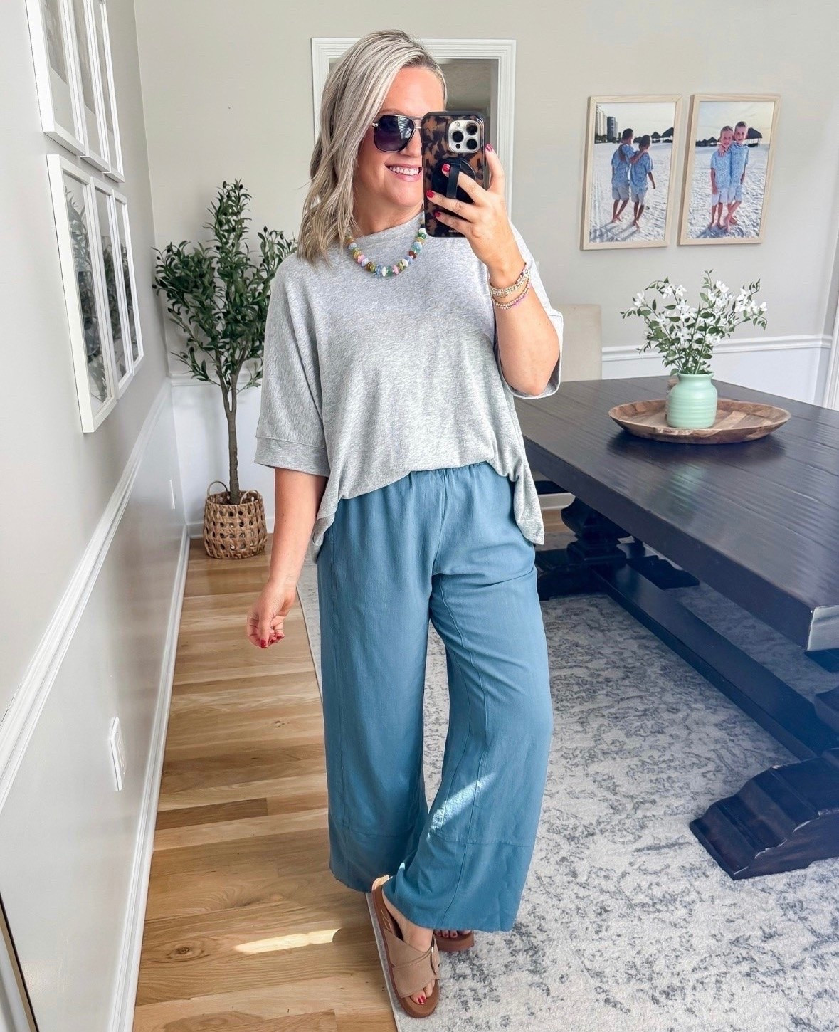 Trending! This is one of those effortless outfits you can throw on and instantly feel put together. The relaxed tee and flowy pants combo is lightweight, comfortable, and perfect for everything from errands to summer travel days.

wide leg pants outfit, casual summer outfit, comfy everyday style, travel outfit, relaxed basics, lightweight outfit, mom style, easy outfit idea, casual chic, neutral fashion, lovelylifestyling

#LTKootd #LTKSeasonal #LTKOver40