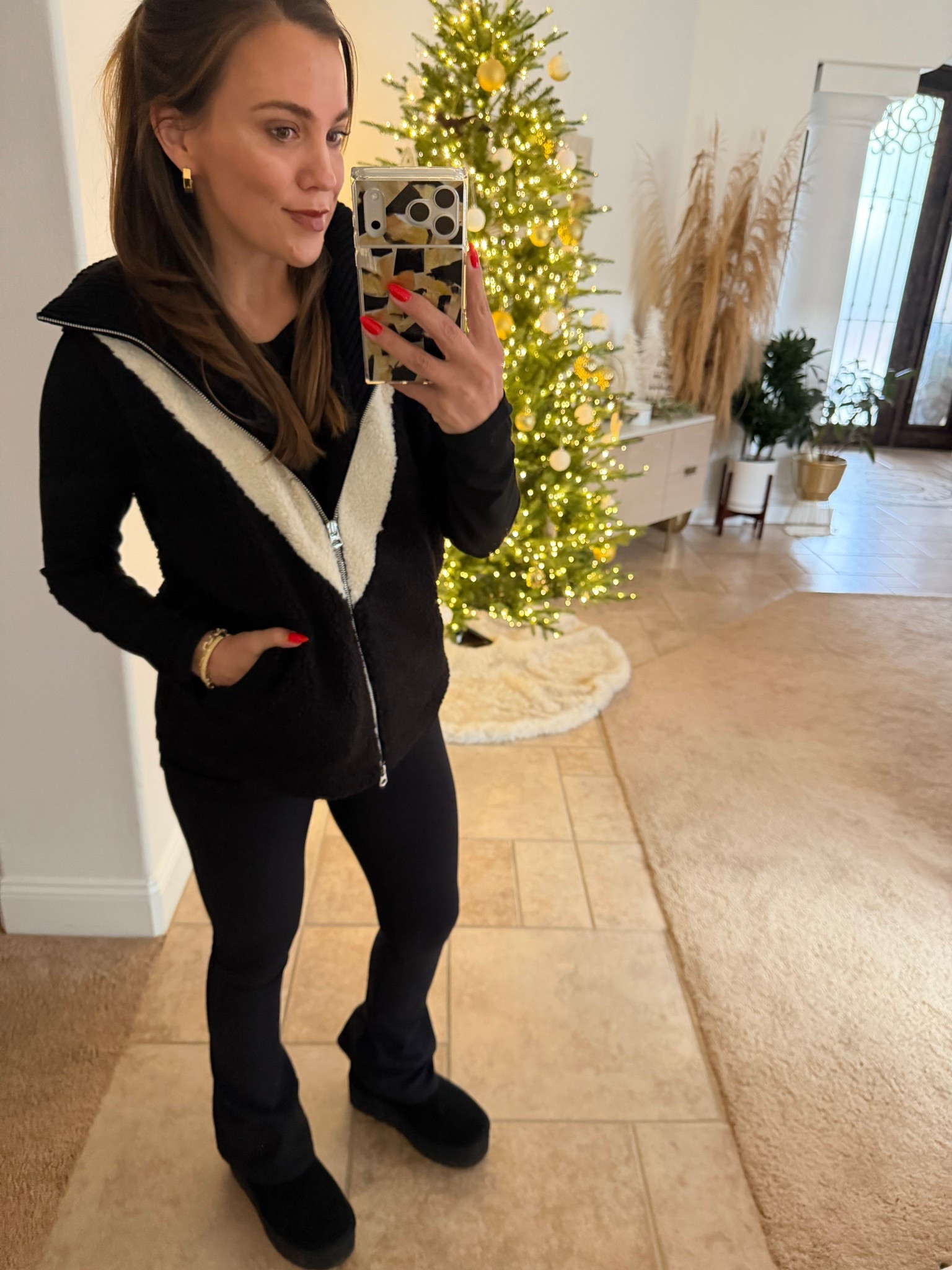 This vest is insanely luxe looking. Dresses up even the simplest outfit! I paired it with the best flare pants in all the land, not even exaggerating. Get the flares on sale now for Cyber Monday!!!


#LTKSaleAlert #LTKCyberWeek #LTKHoliday