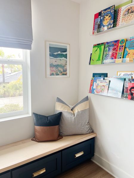 My sons little reading nook, with window seat perfect for a rainy day at home 📚

Kids Room
Book Organization 
Accent Pillows

#LTKMostLoved 

#LTKhome #LTKkids
