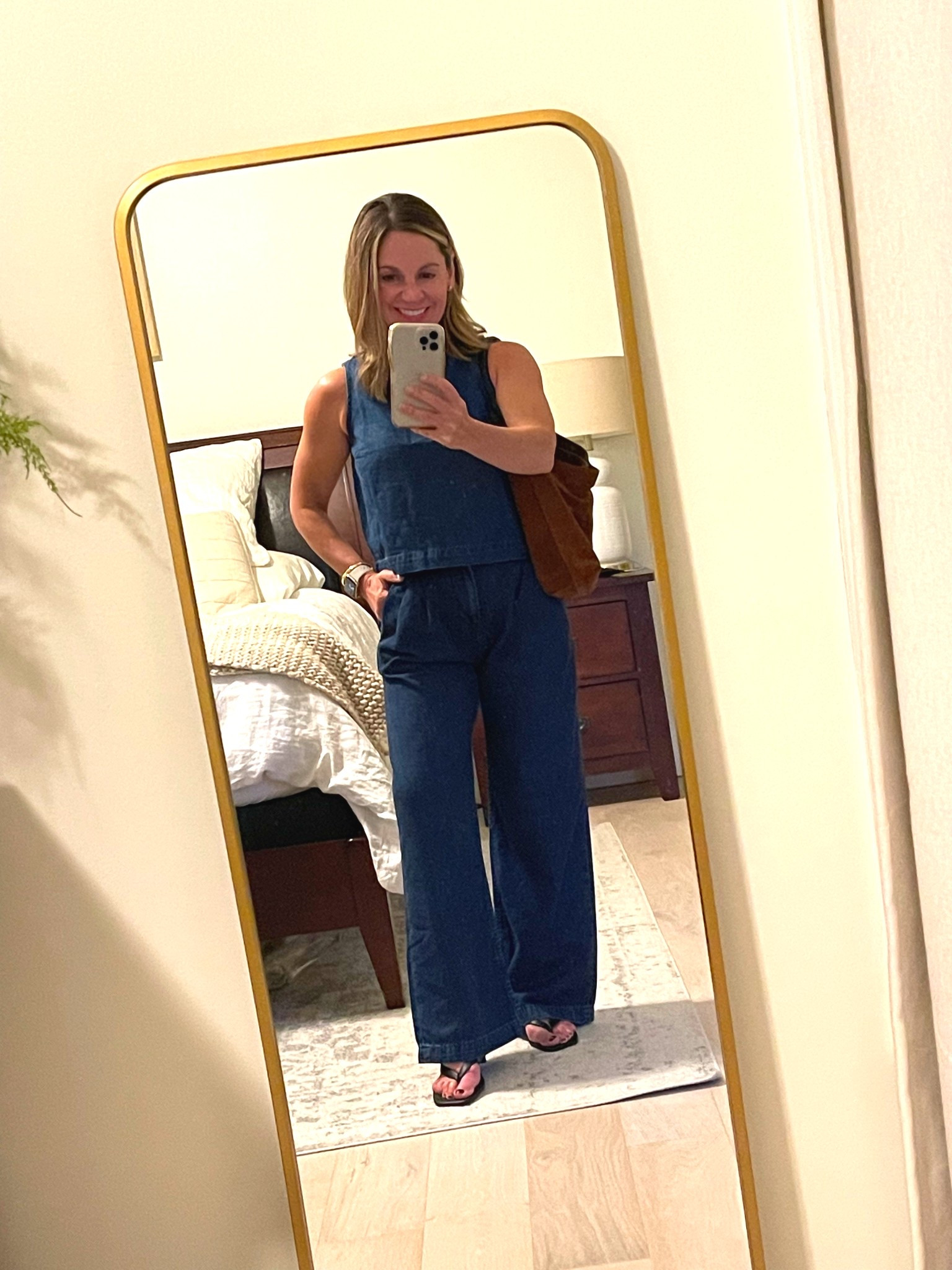Pretending it isn’t 85 in mid-October!! Staying comfortable in this denim set, but styling with a suede hobo bag to make it more fall-like. Loving the size, shape and quality of this bag - I’ve been picking it up even more than I thought! 
Everything fits tts. These trouser jeans will be easy to style as weather cools down!
 #petite #ltkover50

For ref
Top - XS (sold out in this wash)
Pants - 0 petite (no need to hem!)
Bag - Madewell
Kitten heel - Nordstrom

#LTKFindsUnder100 #LTKOver40 #LTKPetite