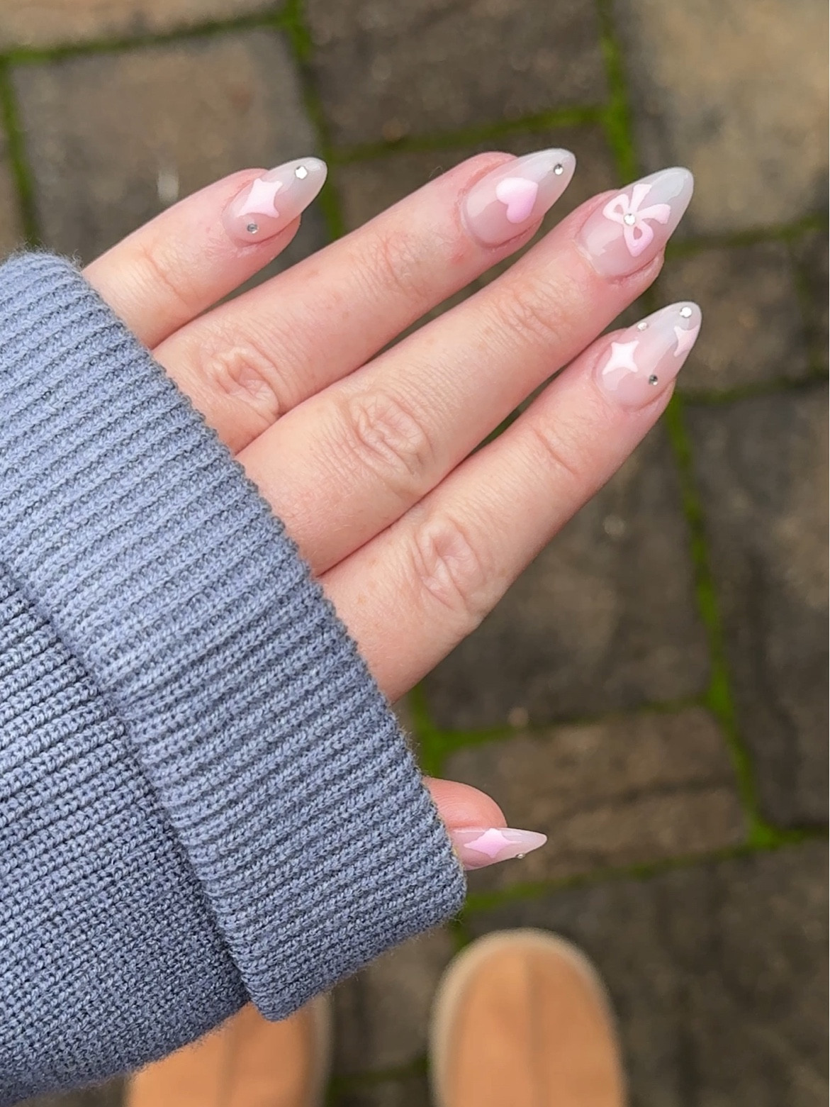 These pink ribbon/bow coquette nails are all the trend this Valentines Day season, the season of love! I opted in for a nude milky pink base, with a bow, heart, stars, and rhinestones 🎀✨💗

#LTKMostLoved #LTKbeauty #LTKSeasonal