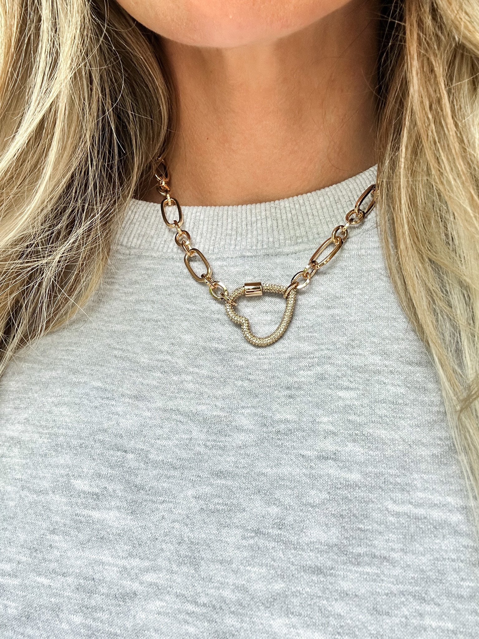 In love with this gorgeous gold link necklace! The heart is the clasp to take on & off. High quality & lightweight material. Looks super cute with loungewear or dressed up 💕 #jewelry

#LTKGiftGuide #LTKunder100 #LTKstyletip
