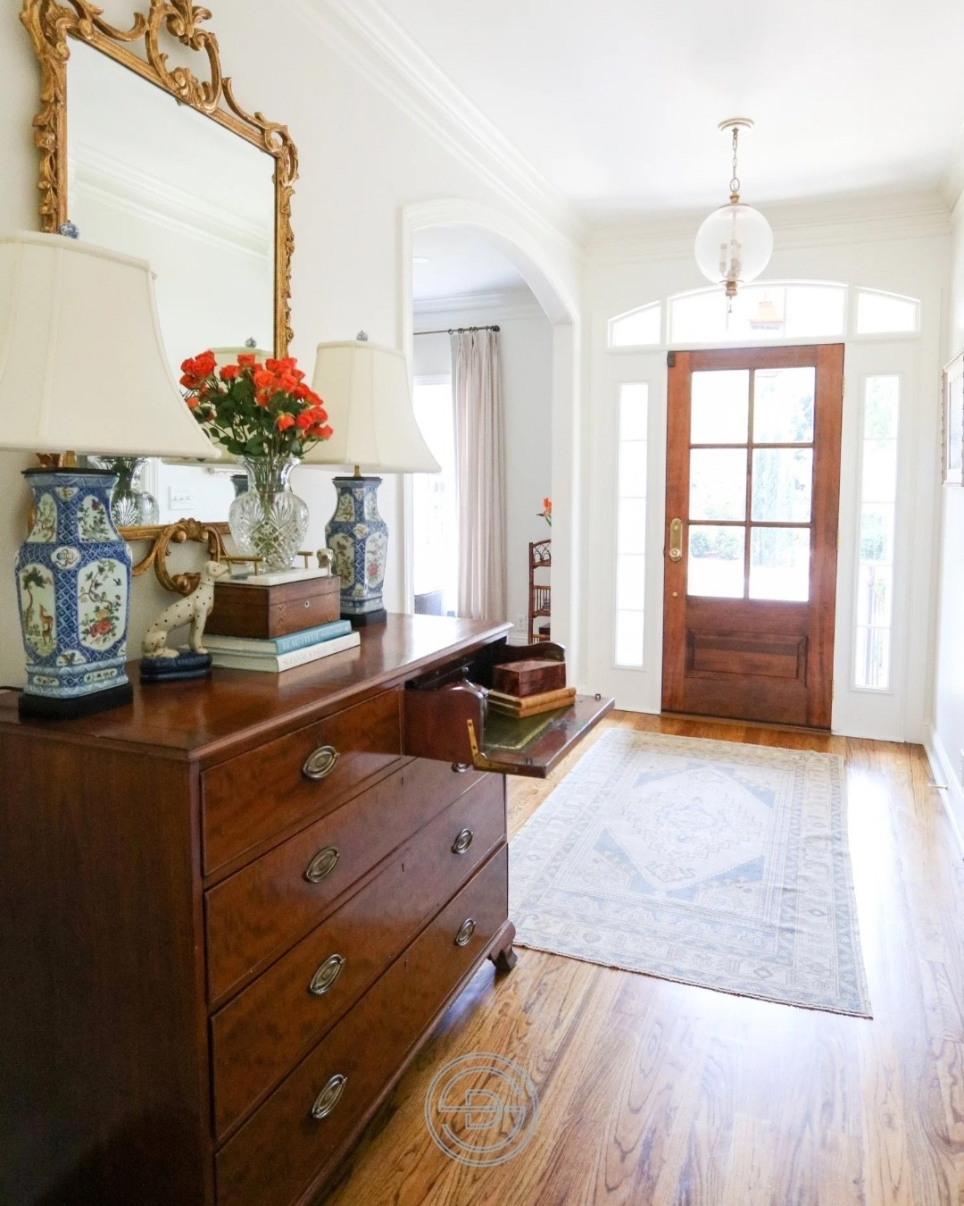 Classic Southern charm, right from the front door 🤍

Layered antiques, warm wood tones, and timeless blue and white accents set the tone for a home that feels welcoming, collected, and effortlessly elegant. First impressions matter, and this one speaks for itself.

#LTKHome