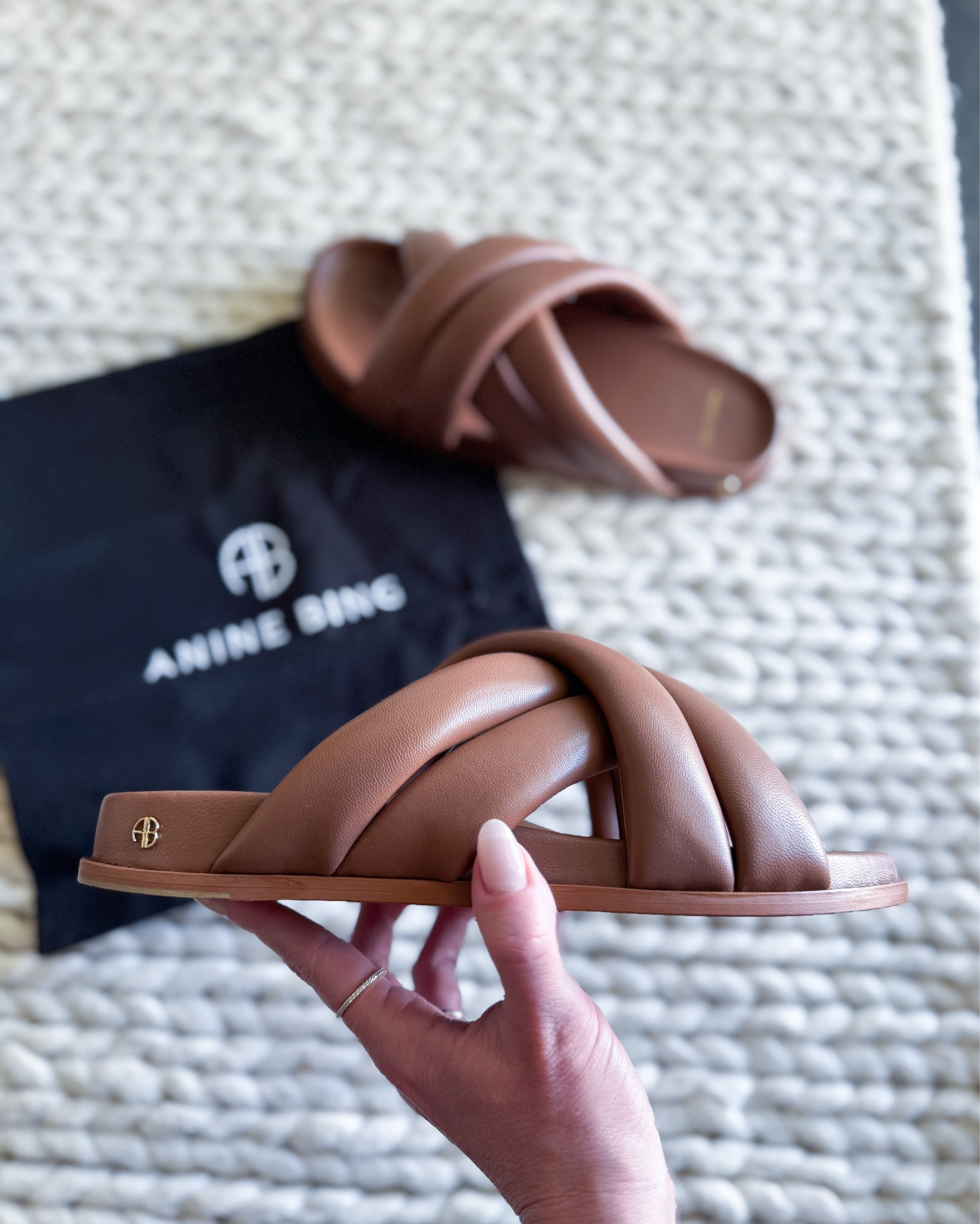 Grabbed these beautiful leather flat sandals with puffy cross-over straps & a padded sole. Not only are they stunning, they are so comfortable. 

Lizzie Slide - Leather Sandals - Anine Bing - Cute Sandals - Summer Shoes  

