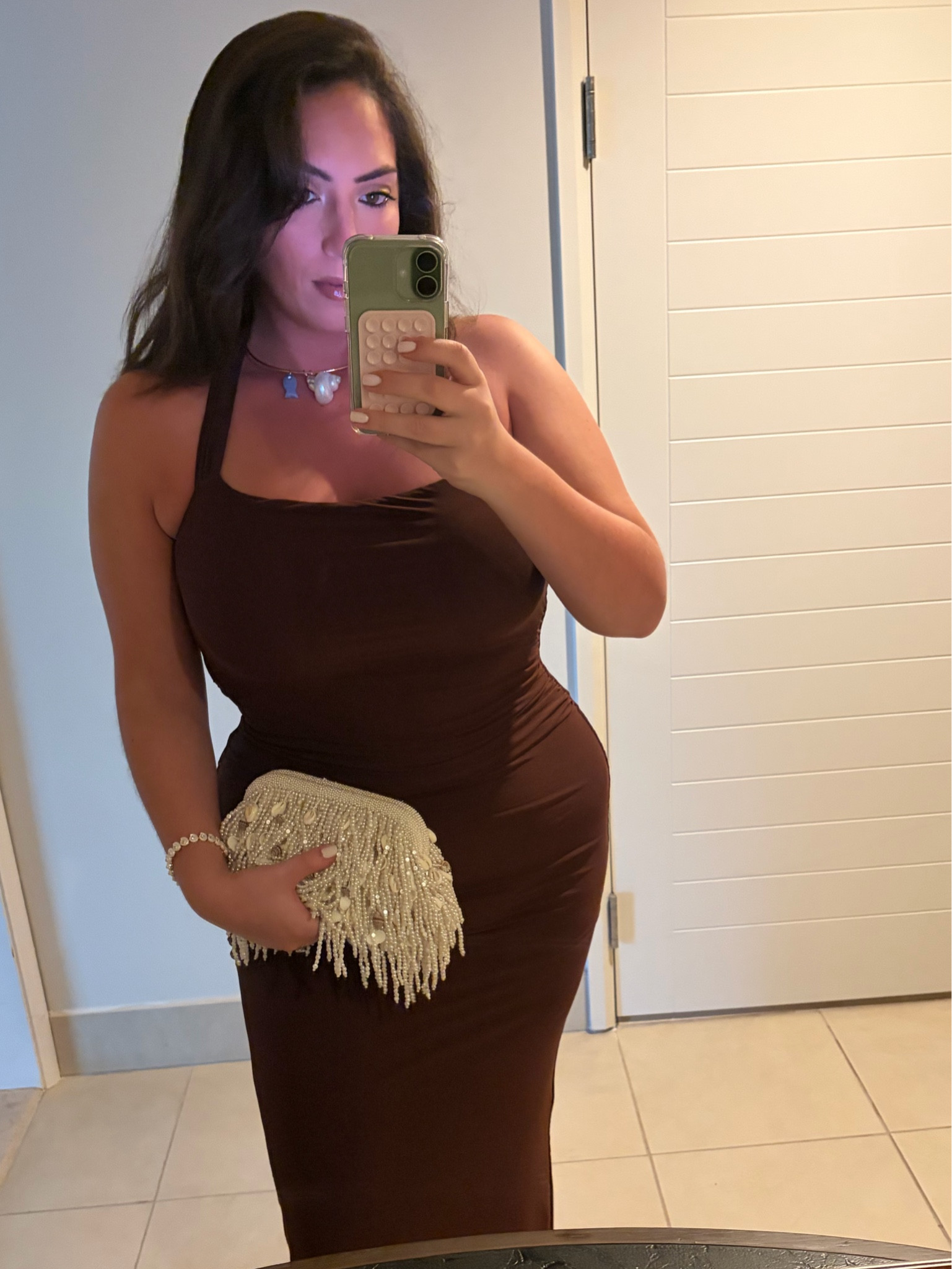 Gorgeous chocolate brown vacation dinner outfit. I was captivated by this stunning seashell clutch when I thought in the store and knew I needed it. It pairs so well with this brown halter dress and seashell necklace ￼￼

vacation outfit. Vacation dinner outfit. Brown dress. Brown maxi dress. Brown halter dress. Halter dress. Seashell clutch. Seashell jewelry. Choker necklace. Metal choker necklace. Charm necklace. Vacation jewelry. Vacation style. Vacation outfit.

#LTKgrwm #LTKootd #LTKMidsize