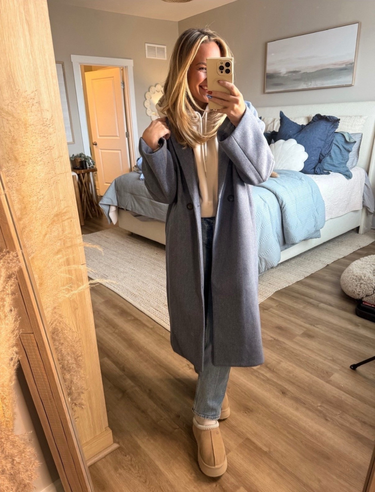 Low effort, high reward winter outfit. A neutral wool-style coat layered over a cozy hoodie with straight-leg jeans and classic slippers is my go-to for everyday style. Comfortable, polished, and easy to recreate for cold weather days.

winter outfit, neutral outfit, everyday outfit, casual chic, cozy layers, coat outfit, hoodie outfit, straight leg jeans, mom style, cold weather outfit, comfy outfit, casual winter style