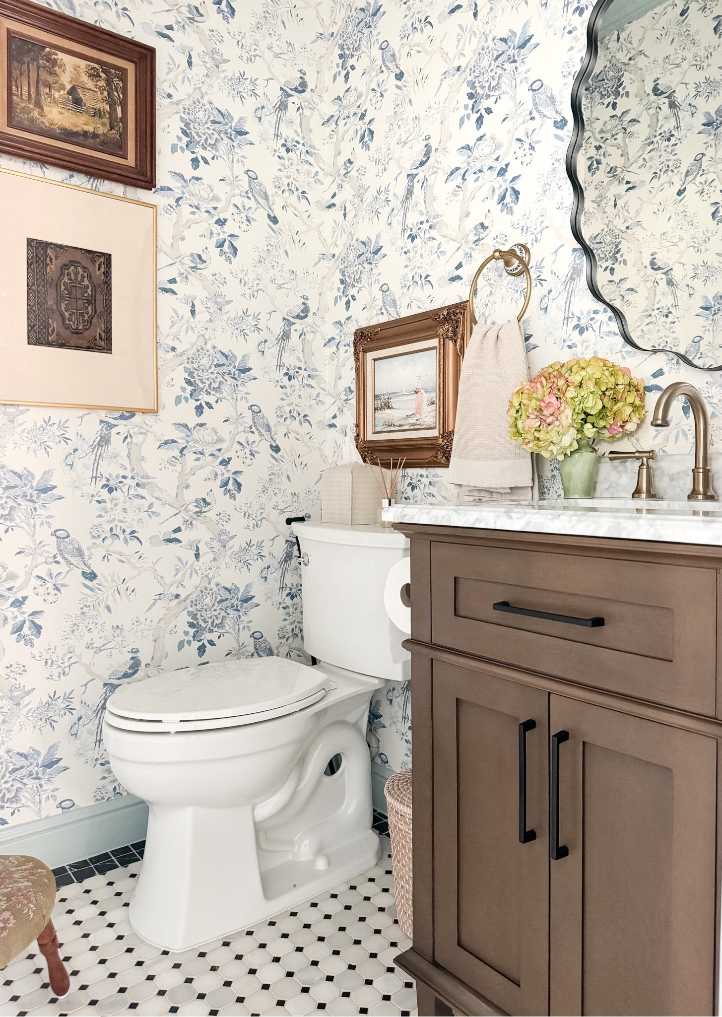 Powder bathroom makeover cottage core design with blue botanical wallpaper and walnut stained vanity and scalloped mirror 

#LTKFindsUnder50 #LTKStyleTip #LTKHome