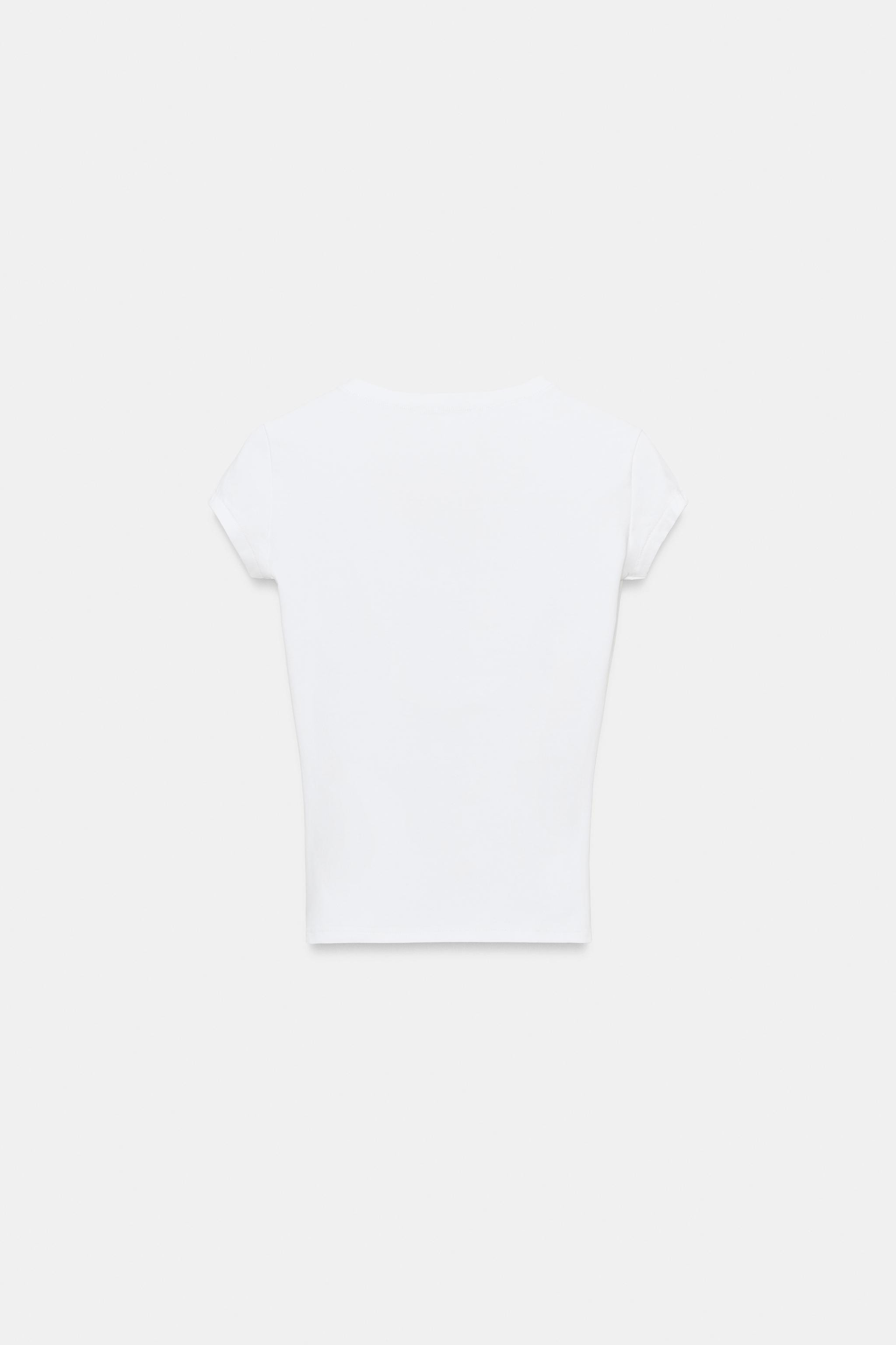 Model height: 178 cmSLIM FIT - V-NECK - REGULAR LENGTH - SHORT SLEEVET-shirt made from a cotton b... | Zara UK
