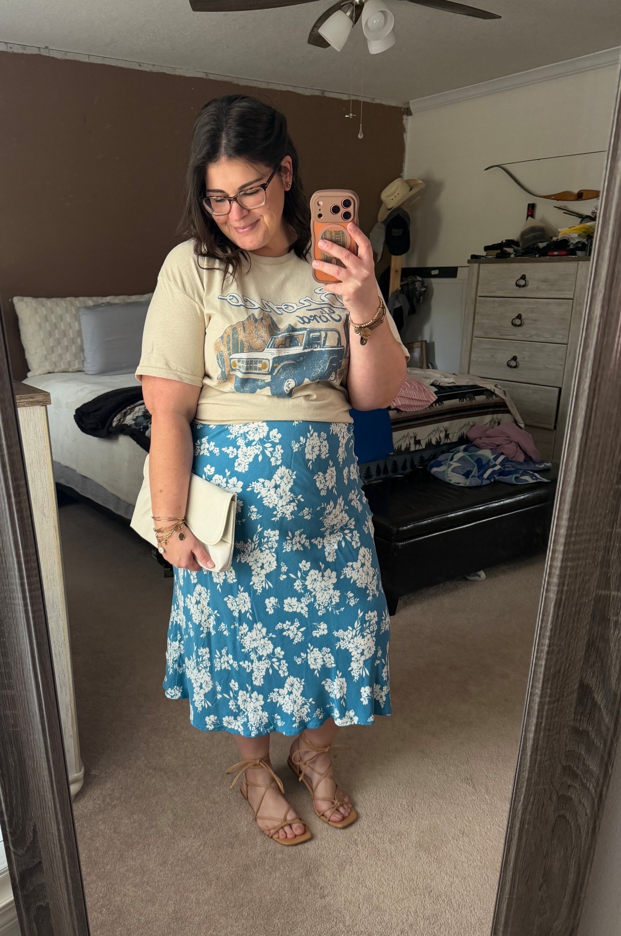 Casual spring date night outfit 🤍🌸
This graphic tee is such a fun piece to add in to a spring wardrobe. I have it paired with this flowy a-line crepe midi skirt from Old Navy, ankle wrap sandals and a vintage clutch. It’s the perfect midsize casual date night look. The only thing I can link is the shirt but I’ve found similar options for everything else 🤍

#LTKMidsize #LTKootd #LTKgrwm