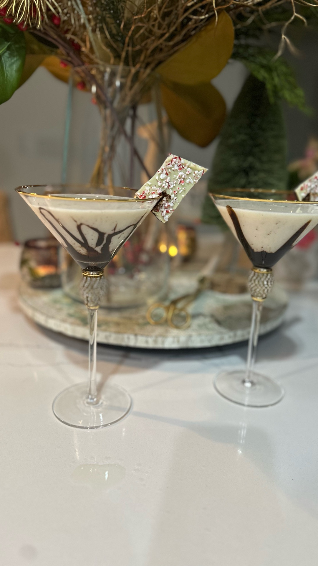 Peppermint Eggnog Martini

8 oz Candy Cane infused vodka (soak crushed candy canes in vodka of choice for 24 hours or until dissolved)
Equal amounts eggnog 

Shake with ice and pour into martini glass with chocolate syrup and garnish with peppermint bark 

Enjoy! 

#LTKHoliday #LTKSeasonal #LTKfoodie