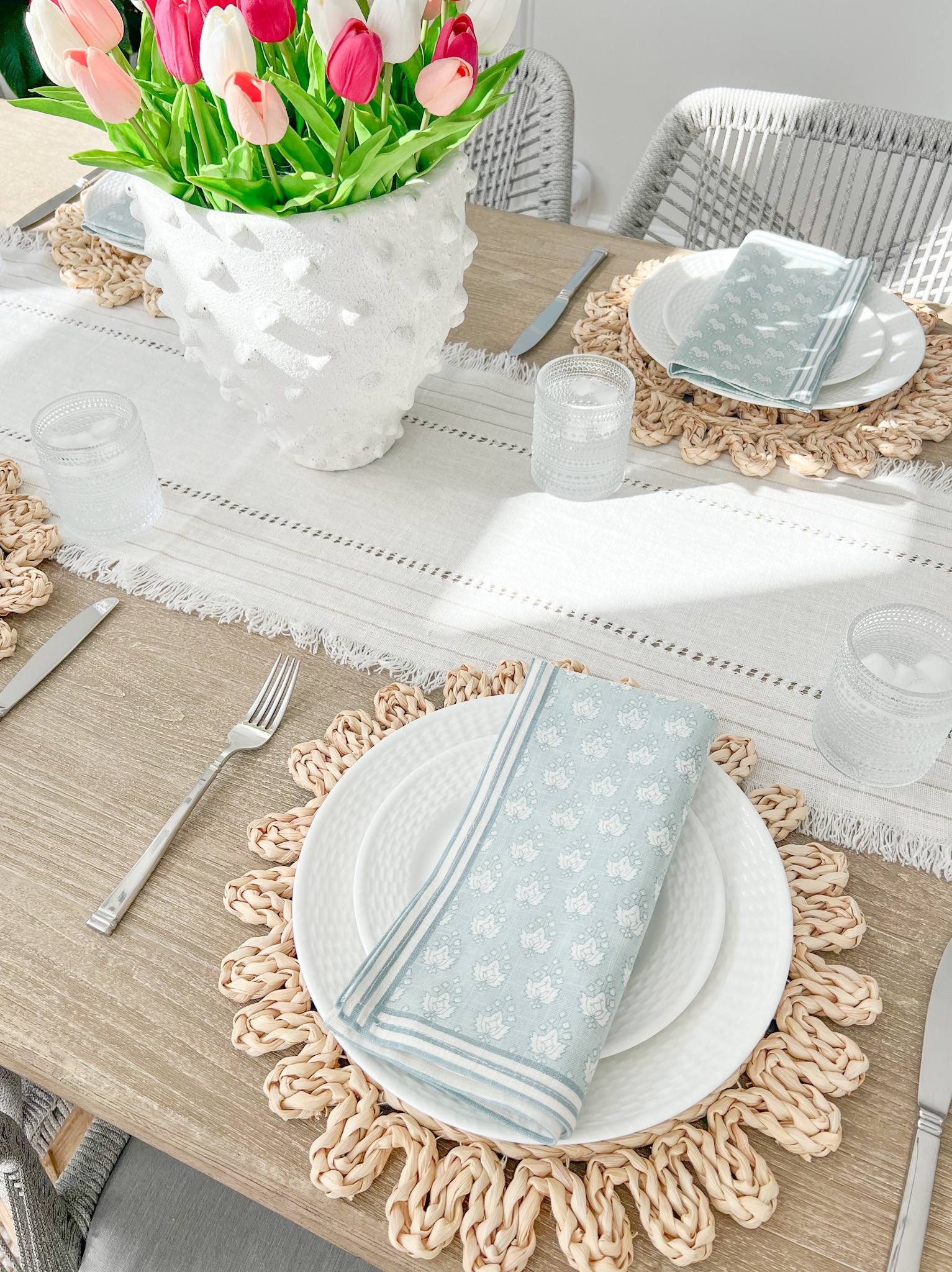 Definitely feeling more like spring in my dining room with the addition of these new pieces from @Wayfair, which I picked up for a spring brunch I’ll be hosting! I just love the clean look of the white plates with these blue block print napkins! #Wayfair #WayfairPartner 
-------
coastal home decor, coastal decor, coastal style, coastal dining room, dining room ideas, neutral dining room, spring home decor, block print decor, block print napkins, white vases, white planter, white pot, dining table decor, spring tablescape, spring place setting, easter tablescape ideas, cloth napkins, woven placemats, white dishes, white dinner plates, white dinnerware,  set, coastal plates, beach house dining room 

 

#LTKHome #LTKSaleAlert #LTKFindsUnder50