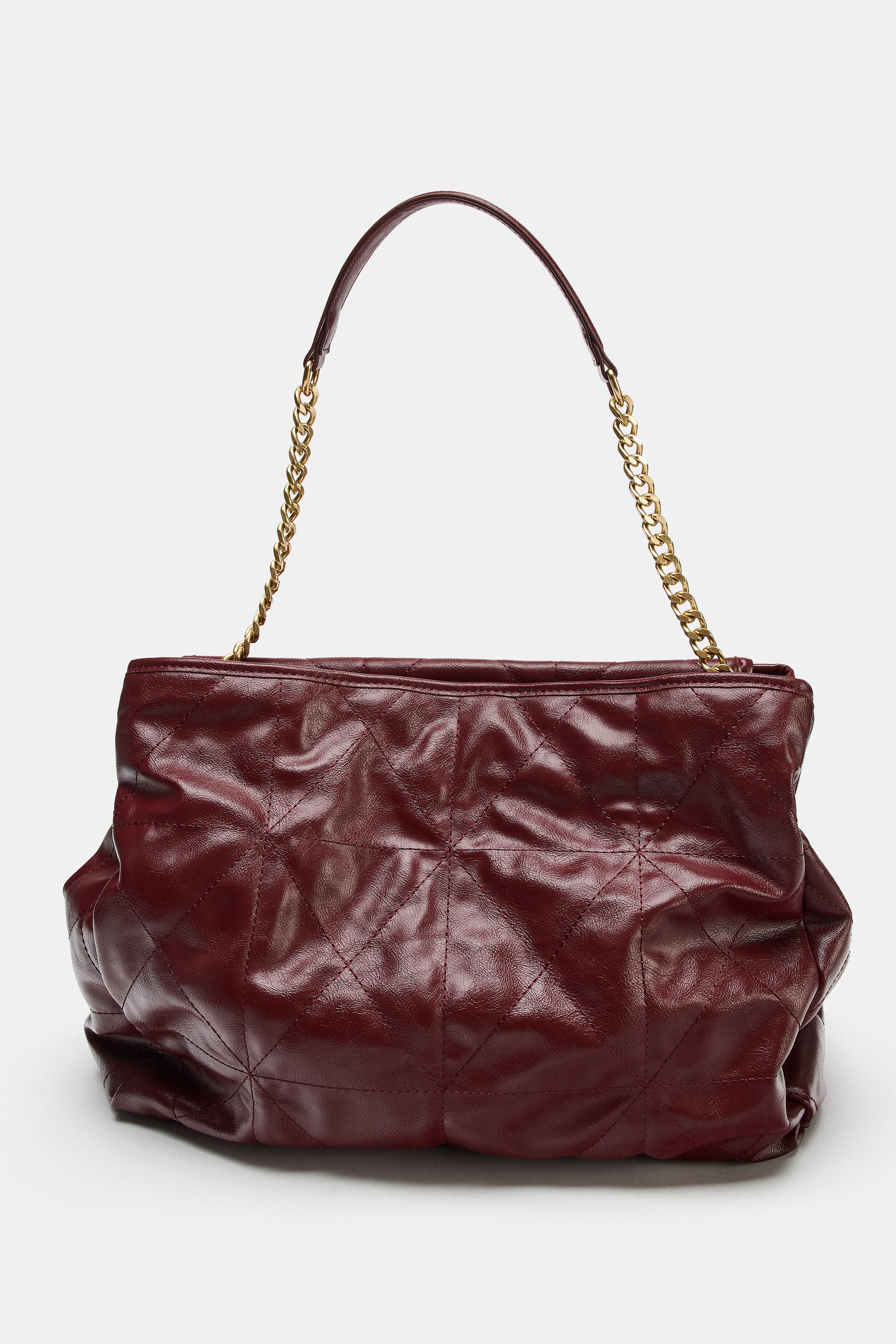 Shopper shoulder bag. Shoulder strap with metal chain in a mix of materials. Interior compartment... | Zara US