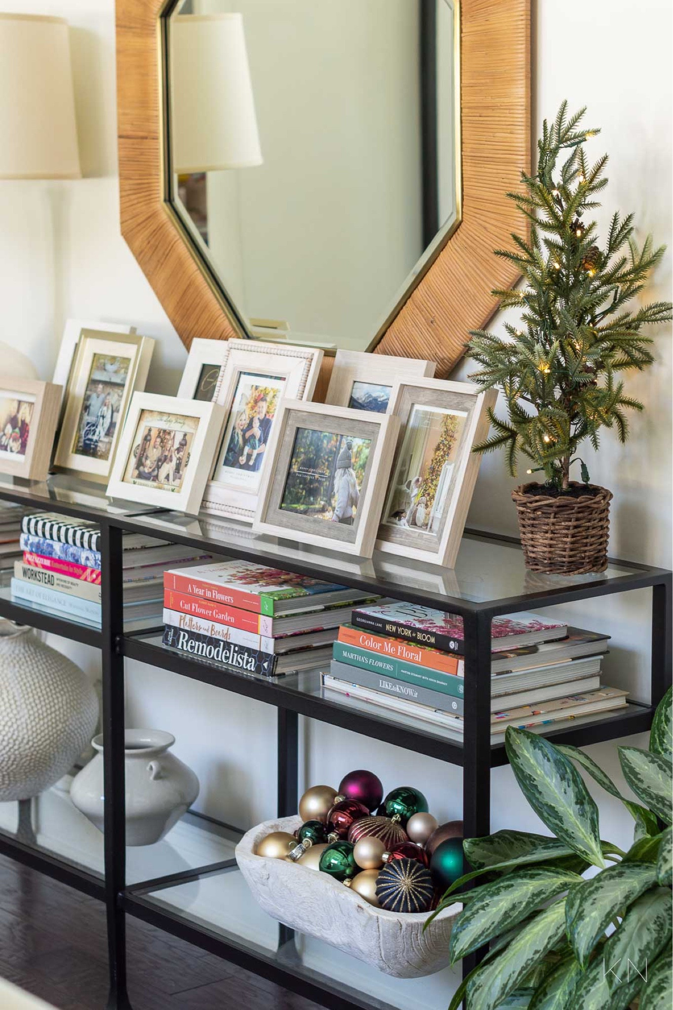 I display our annual family Christmas cards on our living room console table and added a small pre-lit Christmas tree and a bowl of Christmas tree ornaments for a simple and uncluttered holiday vignette. home decor Christmas decor console table styling large textured vase minimalistic Christmas 

#LTKfindsunder50 #LTKHoliday #LTKhome