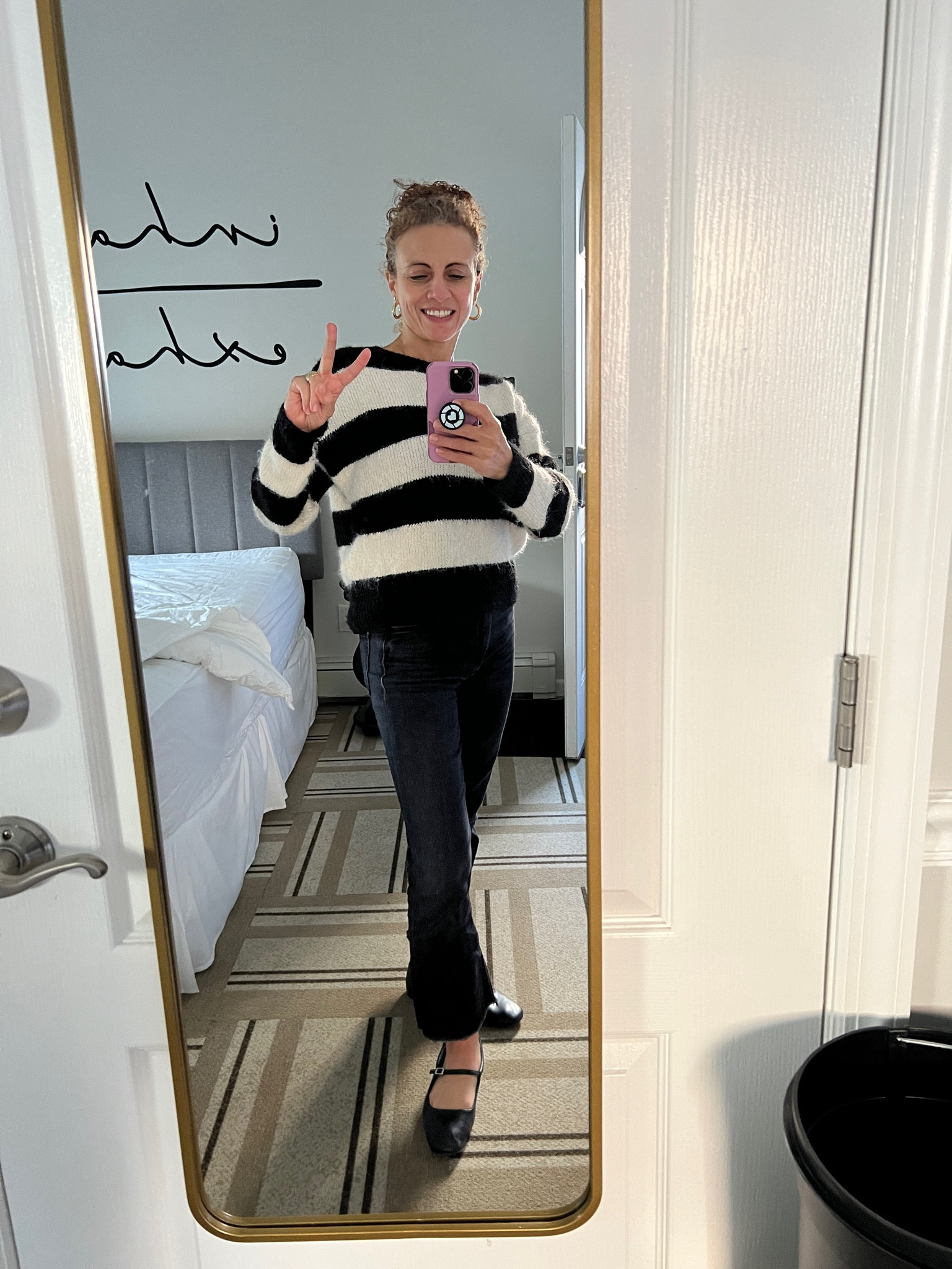 OOTD fall outfit black and white sweater, black mother jeans size 26 with black ballet flats and gold jewelry

#LTKWorkwear #LTKStyleTip #LTKOver40