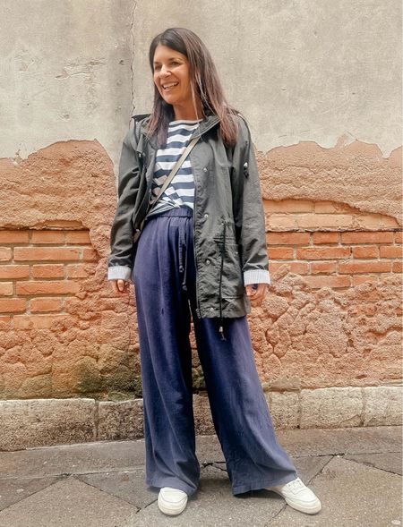 Casual outfit idea! I paired these flowy drawstring navy blue pants with a stripe cap sleeve top and a longer lightweight rain jacket and some casual white Reebok sneakers!



#LTKFindsUnder100 #LTKStyleTip #LTKFindsUnder50