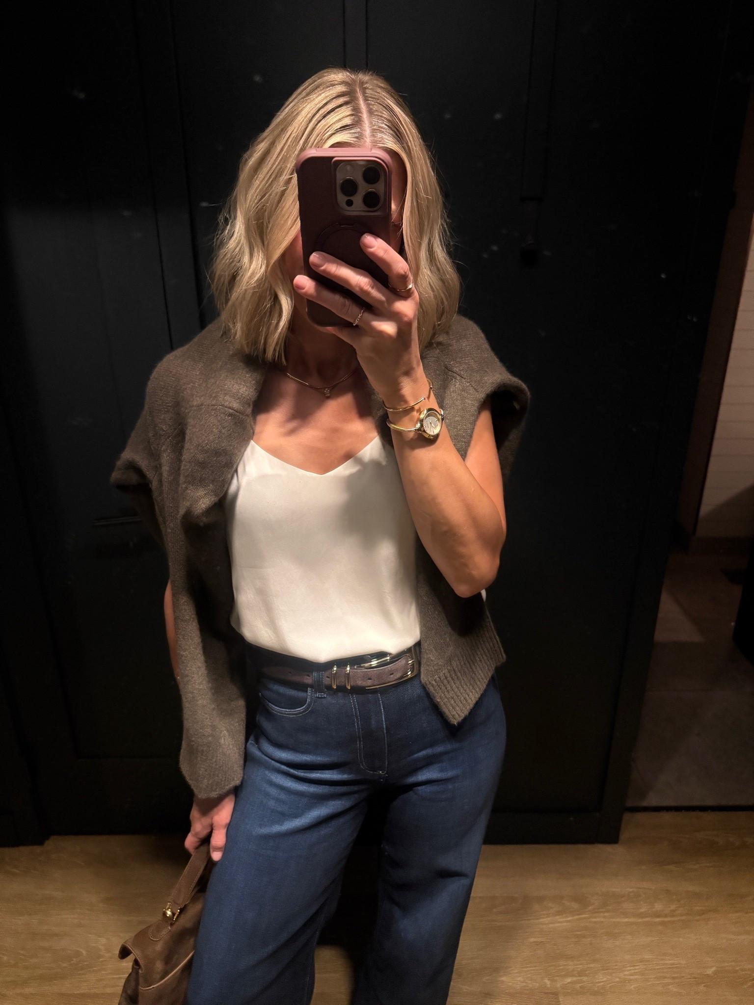 Wearing small silk tank, small cashmere sweater, 25 jeans, small belt, heels tts

#LTKootd #LTKgrwm #LTKOver40