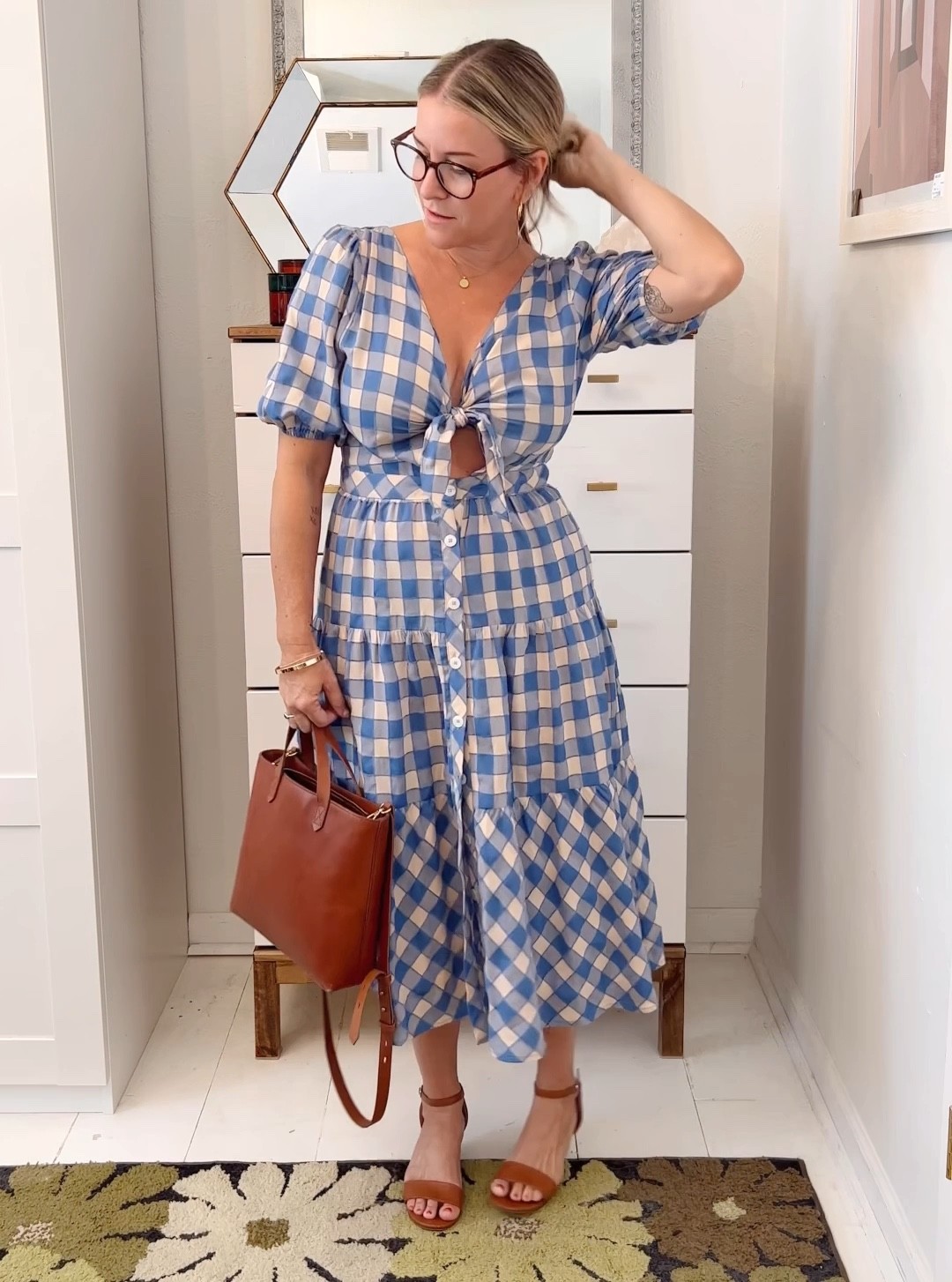 This dress was on heavy rotation this summer, paired with a ratan purse and light tan sandals. I’ll get a few more wears out of it before fall weather hits but I’ll add deeper tan accessories during the transition. *Style tip-If the open front shows a bit too much skin, you can wear this dress backwards, for a little peek-boo back vibe. This is dress is currently on sale!! 

#LTKSeasonal #LTKSale #LTKstyletip
