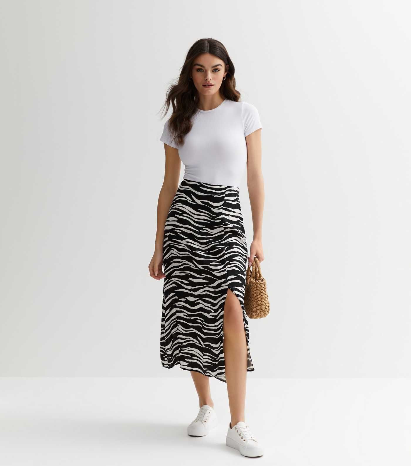 Black Zebra Print Split Hem Midi Skirt
						
						Add to Saved Items
						Remove from Saved It... | New Look (UK)