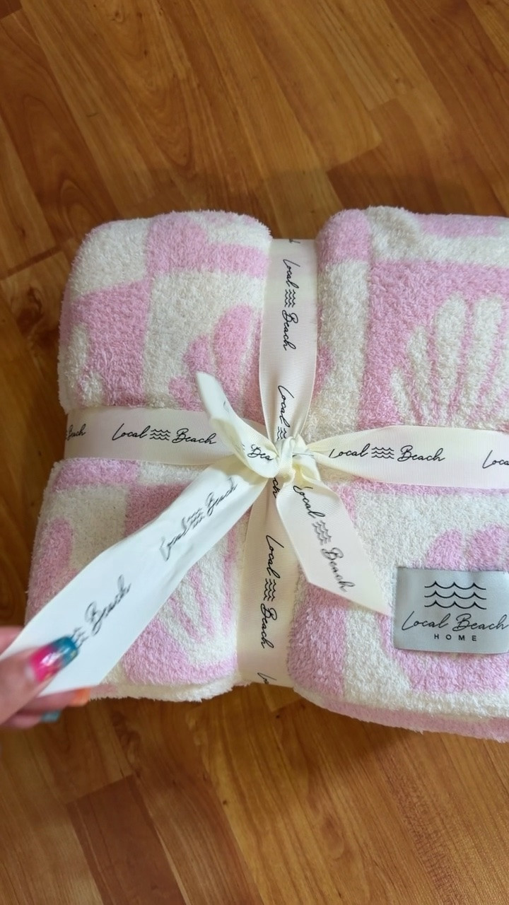 The most perfect blanket! Soft, pink, and has seashells on it 😍😍😍.

#LTKselfcare #LTKHome #LTKTravel