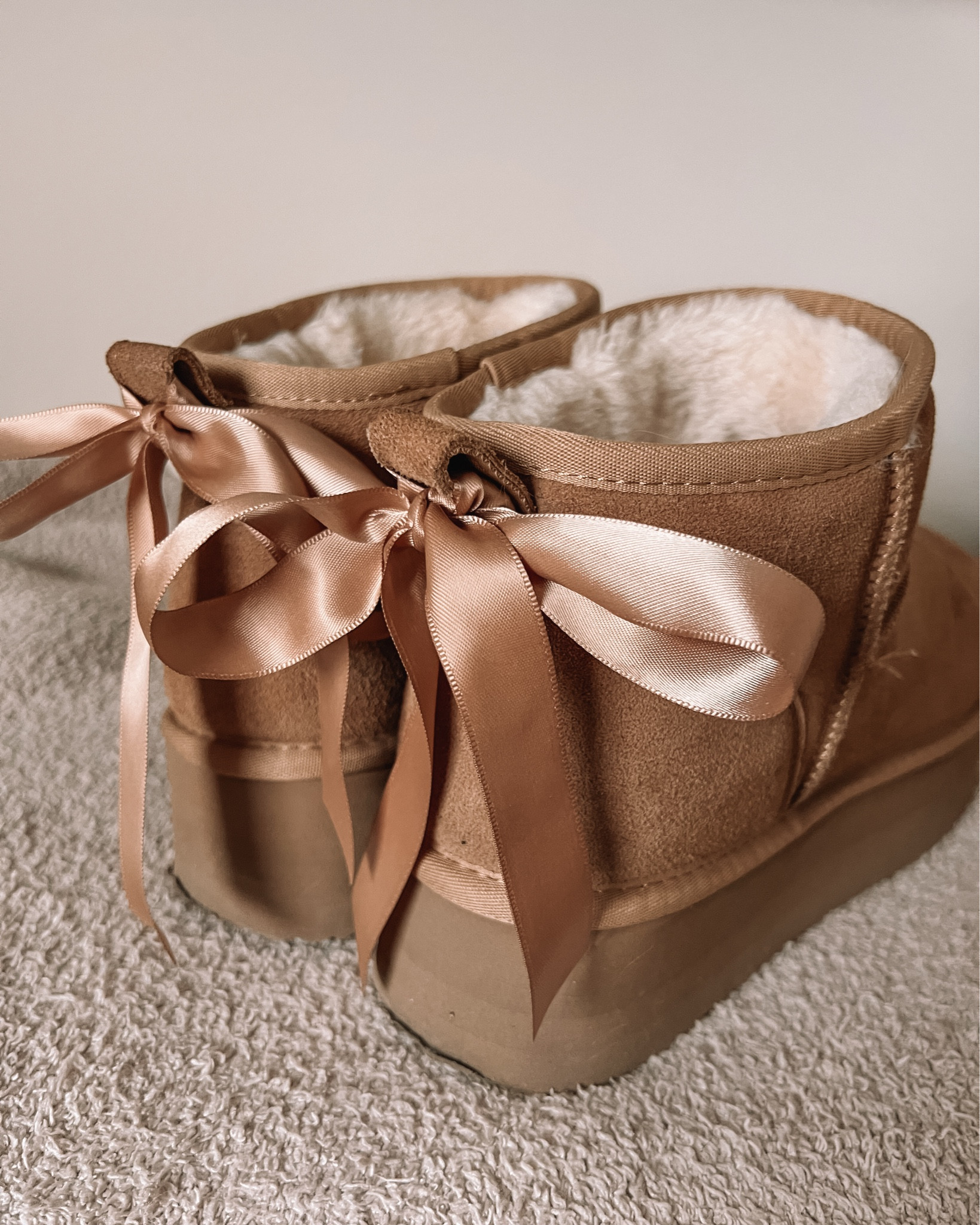 Amazon find on Black Friday sale! These Ugg ultra mini look for less are super cozy and come with ribbons for the cutest bow diy! I’m usually a 9.5-10 (10 in Uggs) and got a 10 in these & they fit perfectly! Platform boots, Ugg lookalikes, Amazon winter fashion


#LTKwinter #LTKsale #LTKsapatos
