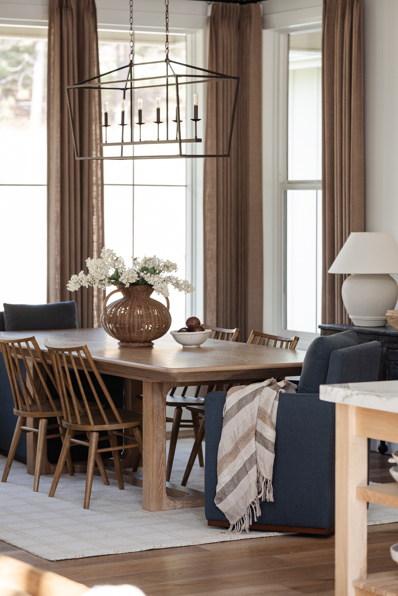 Our casual, lived-in dining room that I love🤍 Dining room, dining table, dining chairs, upholstered chair, chandelier, dining room ideas, curtains, dining room decor, McGee and co, neutral home

#LTKHome