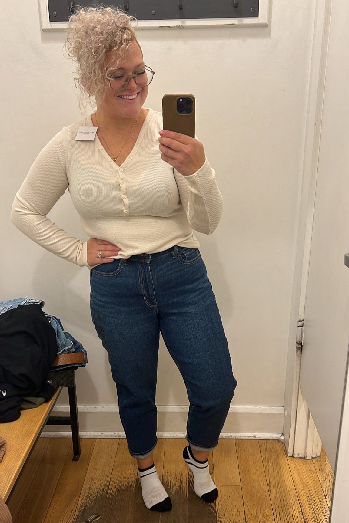Such a cute casual outfit. These jeans were the stretch Mom Jean strigid. Jeans were a size 8 Short.
The cream AE waffle Henley is SUPER cute! I didn’t think I’d like the v-neck, but I was pleasantly surprised. Obviously it’s a bit transparent as I’m wearing a black bra with this one. Wearing a size Large with a 34DD bra size  

#LTKmidsize #LTKsalealert #LTKCyberWeek