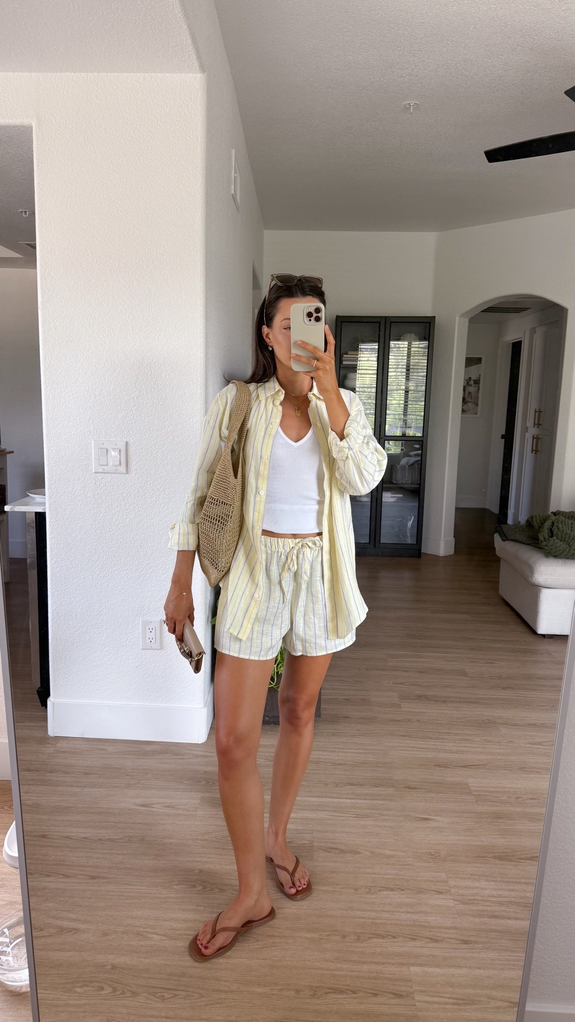 I am 5’7” wearing a size small in the top and shorts and tank top!