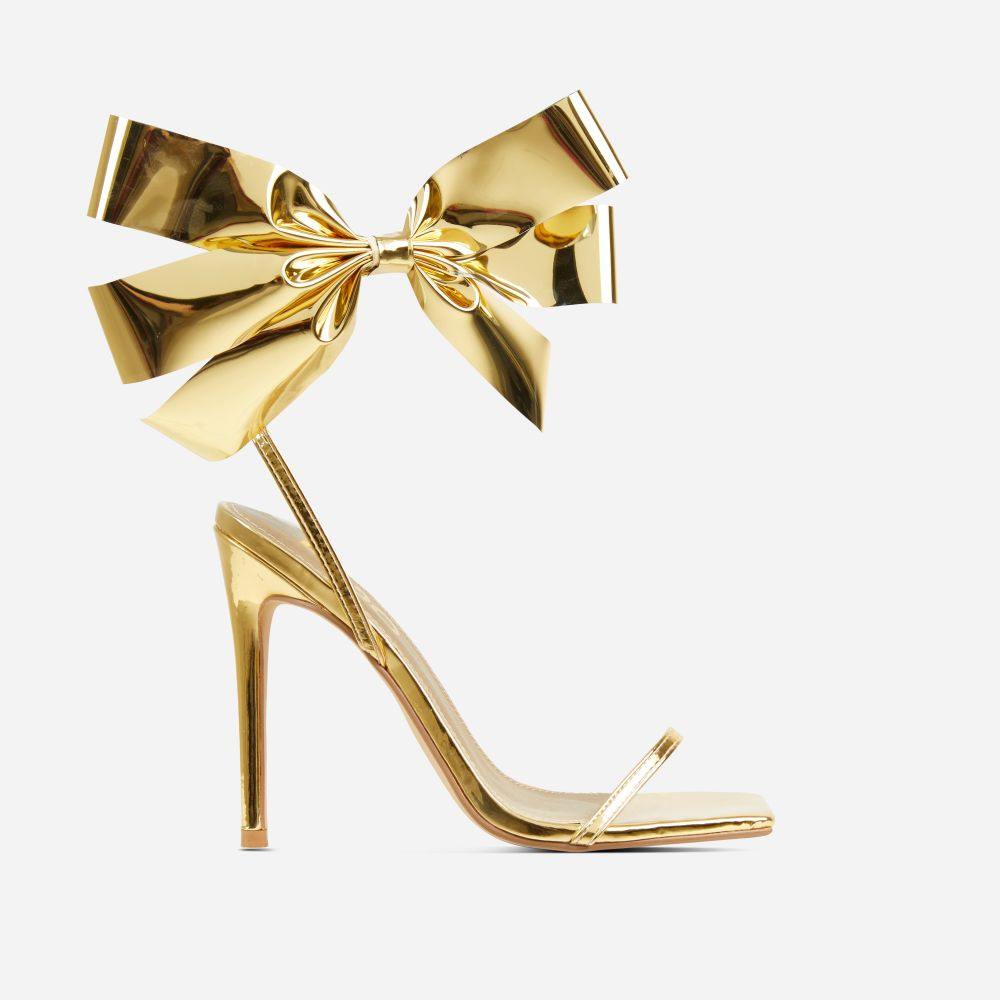 Beau Oversized Bow Detail Square Toe Stiletto Heel In Gold Faux Leather | EGO (UK)