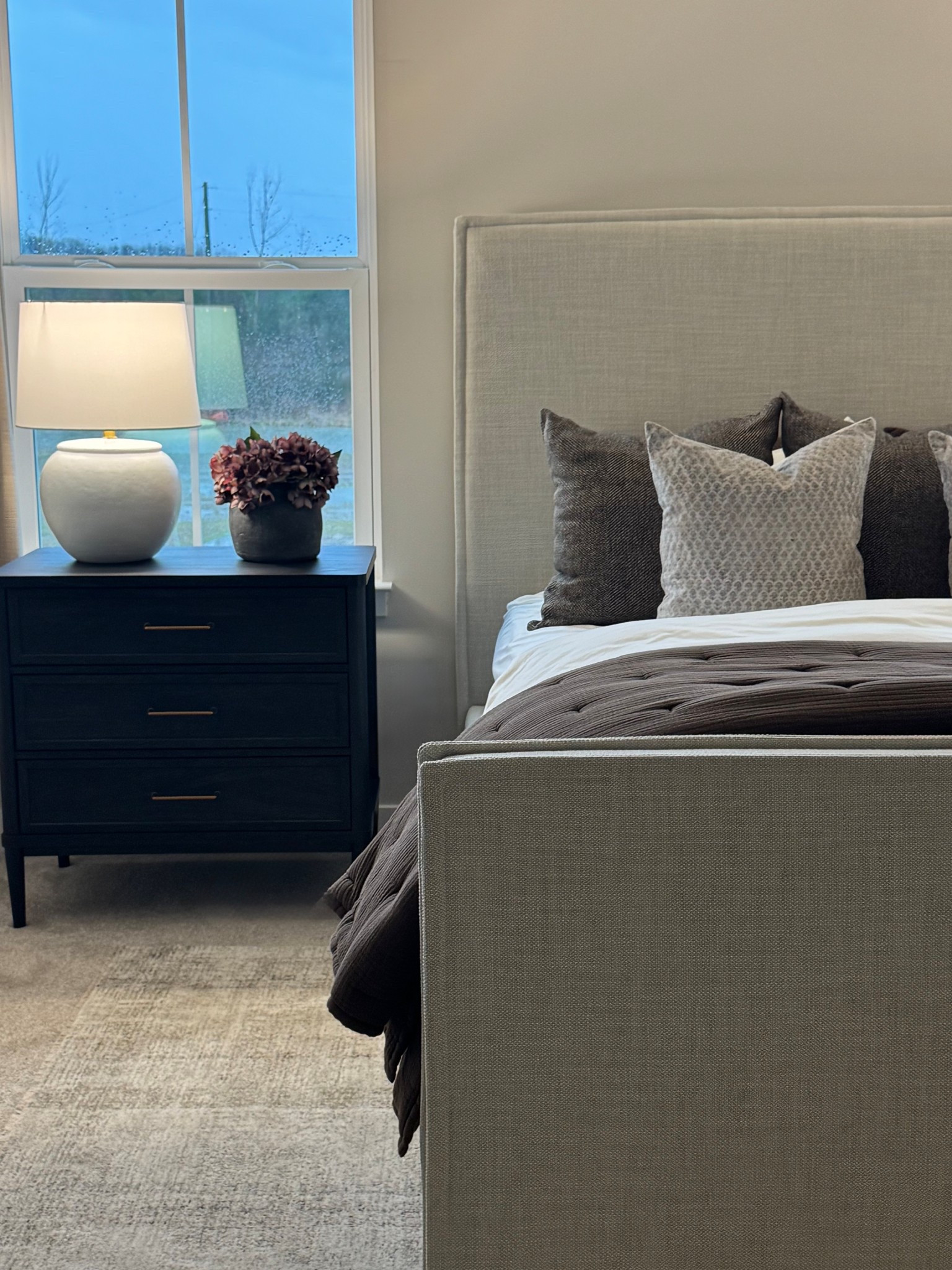 Neutral bedding, cream duvet, duvet insert, black nightstand, floral pillow cover, clay vase, gray vase, cream area rug, bedroom decor, bedroom, bedding, upholstered bed, Bernhardt bed, dusty plum hydrangeas 

#LTKSeasonal #LTKSaleAlert #LTKHome