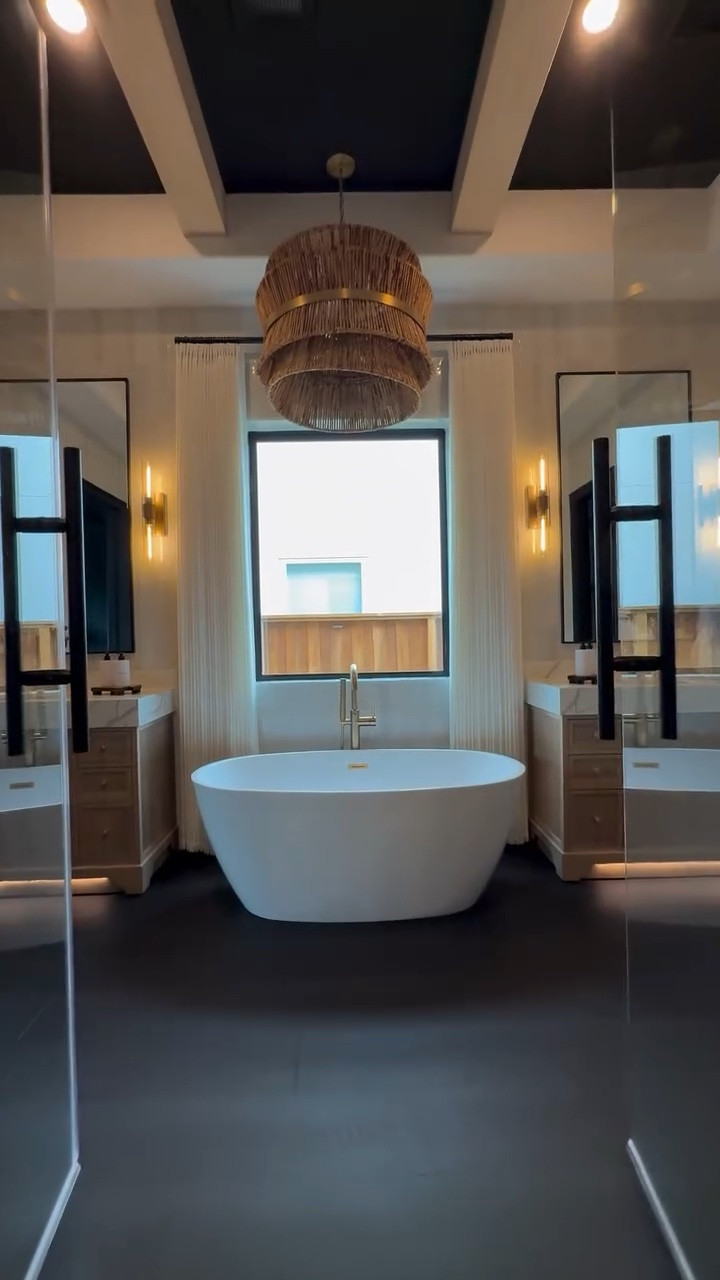 You can absolutely work with your builder grade framework to create a beautiful custom feel in your home. In this primary bathroom, I kept the original layout and framing, but updated the vanity, tub, flooring, and finishes to completely transform the space into something that feels elevated, warm, and much more personal.

Edit Inspo: @emm_interiors

🛒 Click the link below — all products are linked for easy purchase!

#LTKSaleAlert #LTKHome #LTKStyleTip #BathroomInspo #BathroomRemodel #BuilderGradeUpgrade #HomeRenovation #CustomLook #BathroomDesign #HomeMakeover #InteriorInspo #WarmHome