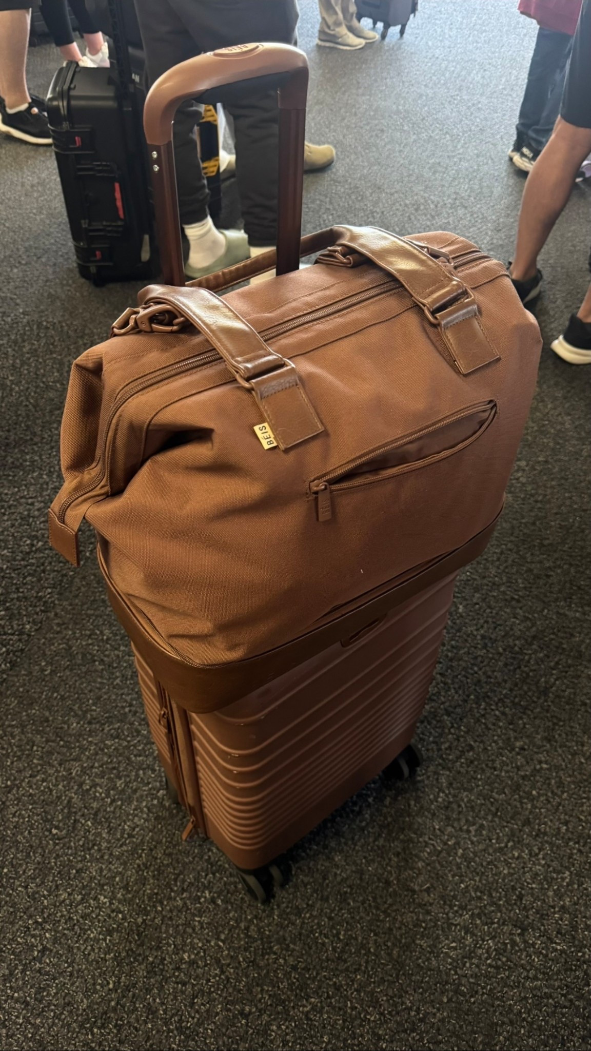 Everything brown for a travel day 🤎 obsessed with my Beis luggage. I’ve had it for so LONG and always get so many compliments. 

I am also linking my husbands suitcase that he loves. He travels every month for work and it’s compact, but holds a lot. His suitcase is very sturdy as well! 

suitcase, travel, beis, away luggage 

#LTKHoliday #LTKGiftGuide #LTKTravel