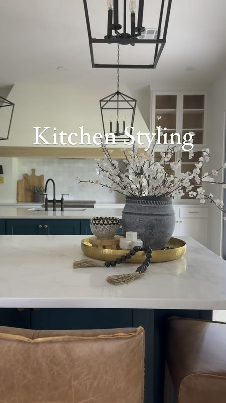 I found the perfect vase and stem combo for summer kitchen styling and had to share:  the vase is on sale for only $34 and it pairs perfectly with these stems from world market.  I also linked the brass tray, black farmhouse beads, marble tabletop decor, and stand and bowls I used for this beautiful kitchen styling I did for my clients  #design #interdesign #dreamkitchen #kitchenstyking 

#LTKHome