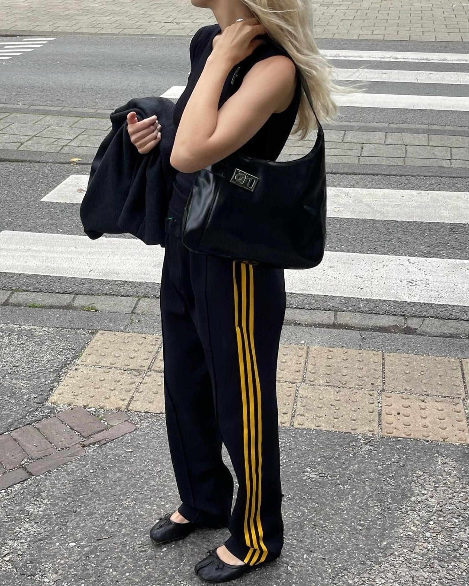 Adidas x Wales Bonner 

three stripe recycled jersey track pants, co-or donating item, Matches fashion, Tabi split toe leather ballet flats, Maison Margiela, trending now, Farfetch. Ferragamo bag, Farfetch, Vestiare collective, vintage bag, Netherlands. 

#LTKSeasonal #LTKstyletip #LTKeurope