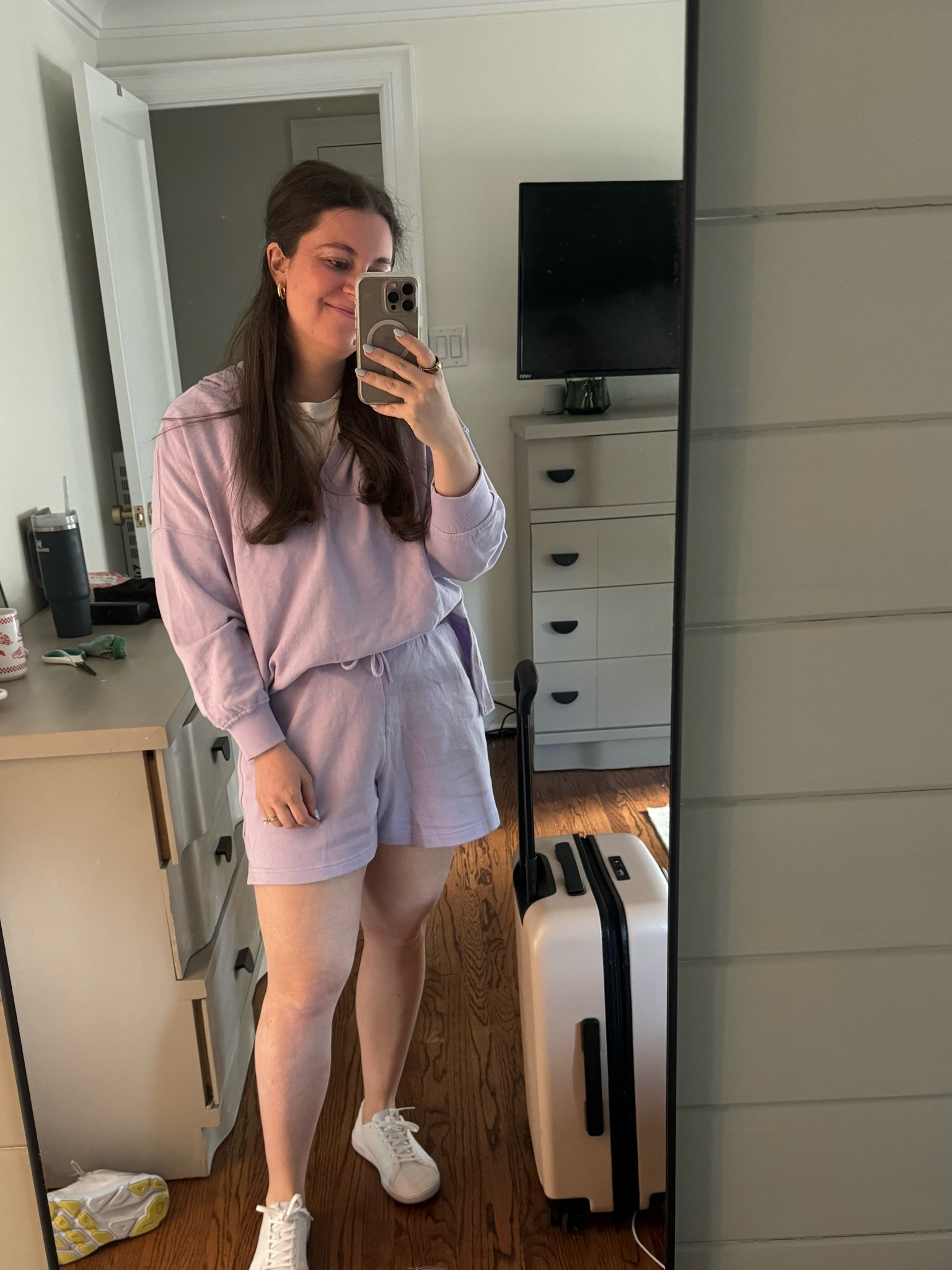 Comfy travel outfit. Love this carryon bag. Fits a lot while still being light and wheels roll smoothly.