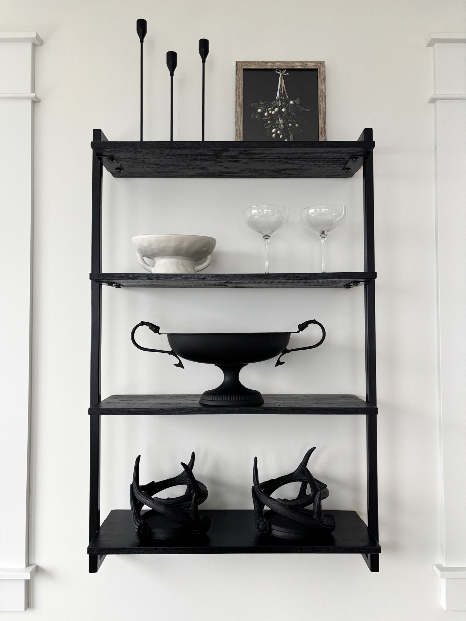 H O L I D A Y S / dining room open shelving styled for the holidays 

The decor on the bottom 2 shelves I’ve had for quite some time, & unfortunately can’t find a similar link. I painted black over the weekend & I’m obsessed. The antlers were white with a light grey base, & the antique style serving dish (for lack of an accurate name), was sliver. 

Amazon Canada | Wayfair | Dark & Moody Christmas Decor 

#LTKcanada #LTKcasa
