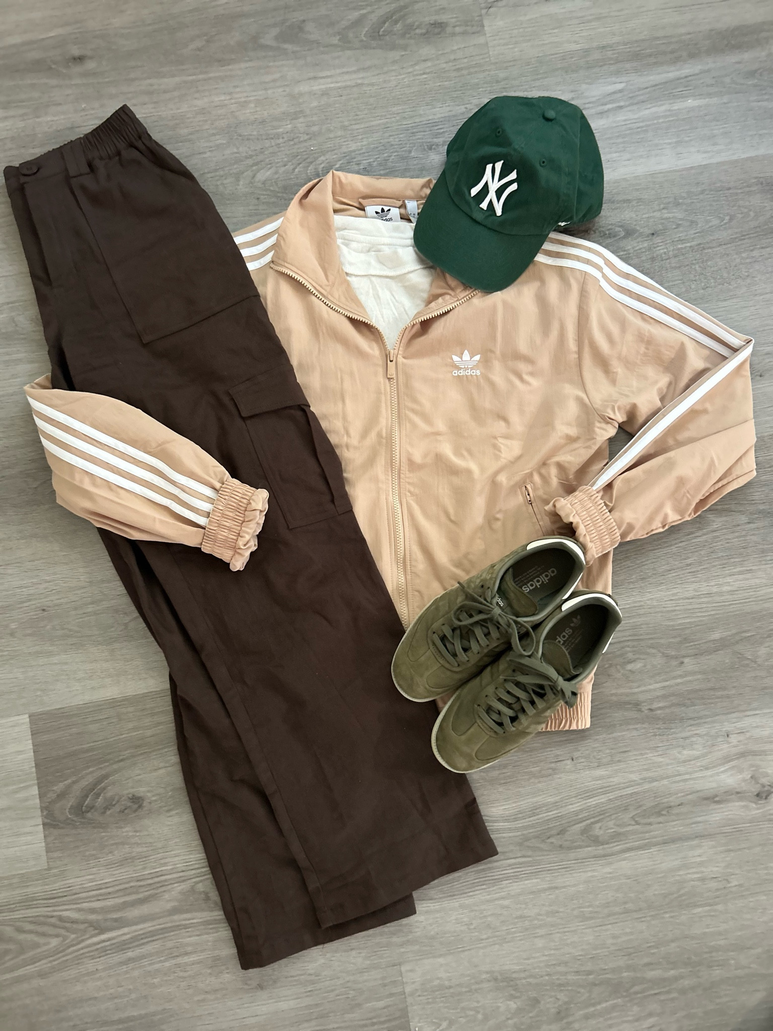 Casual outfit with cargos, green sambas and a pop of green hat

#LTKStyleTip #LTKMens