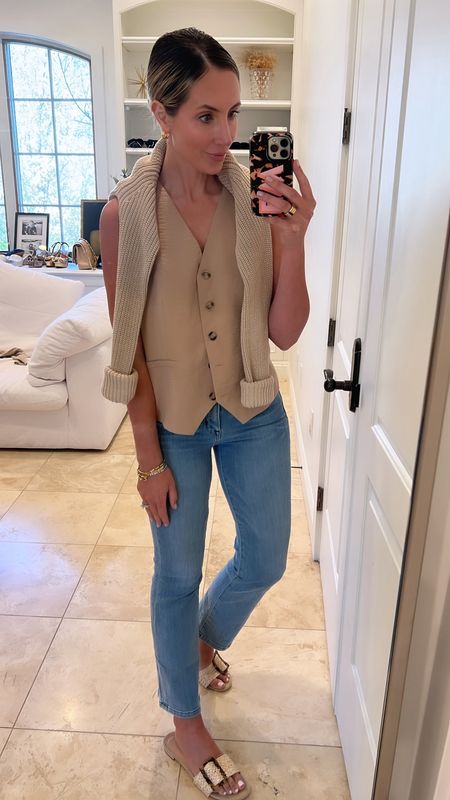 The easiest, chic, transitional outfit. Vest outfit. Vest is from Amazon, jeans - run tts. I take the 25. They come in three washes. The knit sweater is my favorite sweater for over the shoulders for summer. Love. Raffia slides run tts. They look like the $250 ones but are under $30. 

#LTKfindsunder50 #LTKstyletip #LTKfindsunder100