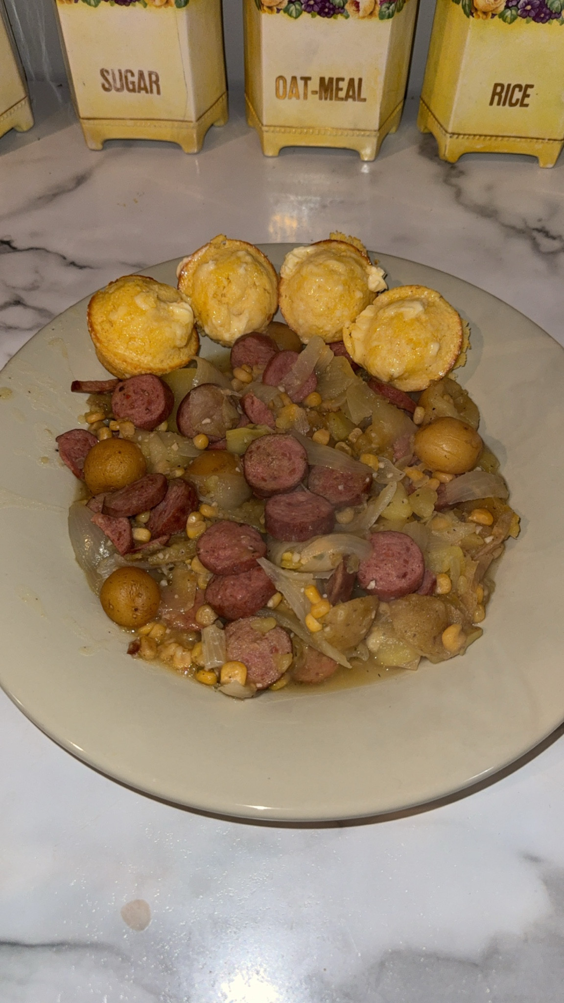 Polis sausage, potatoes, corn, onions and cornbread. YUMMM 

#LTKdayinmylife #LTKmomlife #LTKfoodie