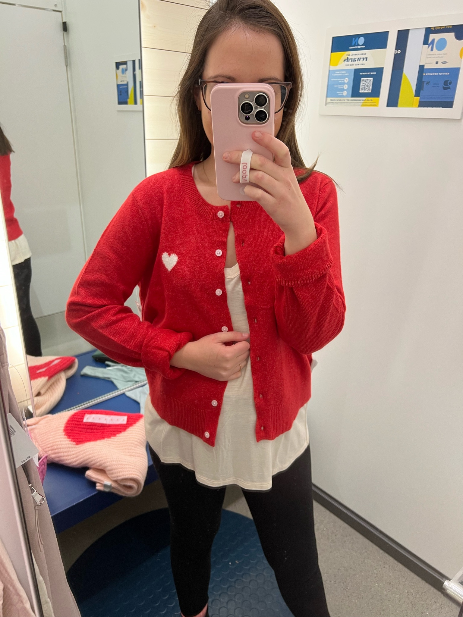Such a cute teacher cardigan for Valentine’s Day! It is meant to be a little cropped. I sized up to a M to avoid the cropped length, hence the rolled sleeves. Super soft!

Sizing:
Tank: stay tts or size down if small chested 
Cardigan: stay tts for a fitted sweater 


#LTKSeasonal #LTKFind #LTKunder50